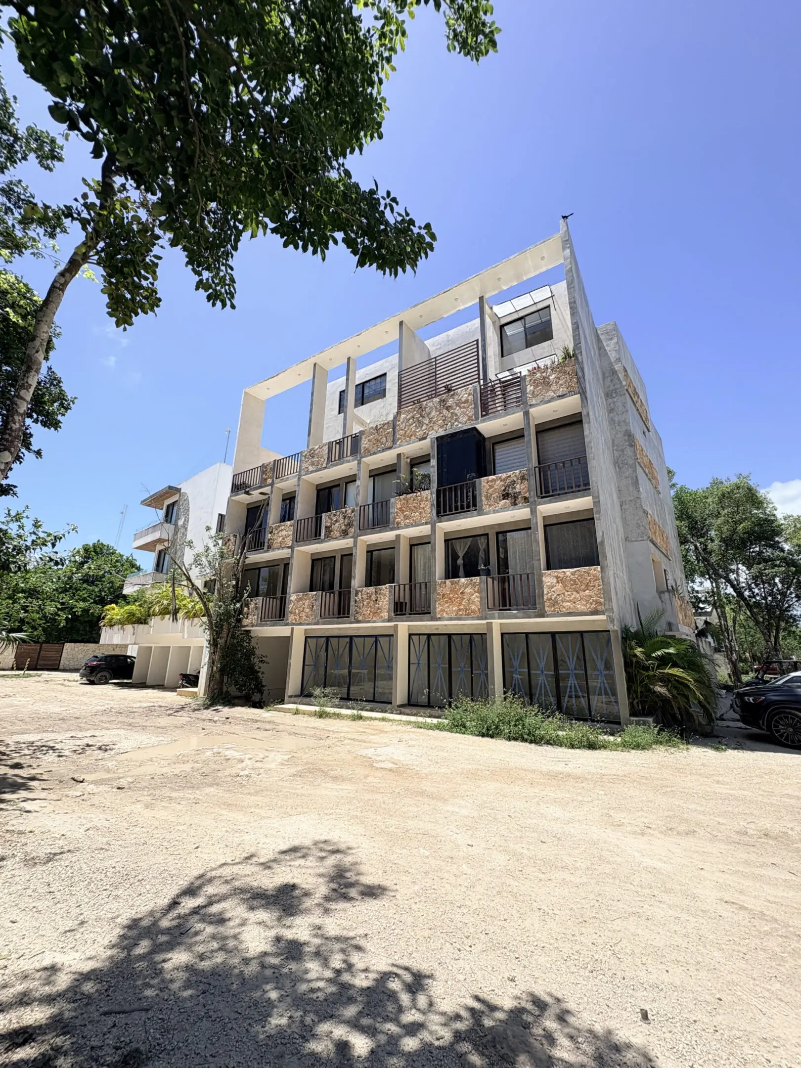Modern multi-story apartment building with balconies