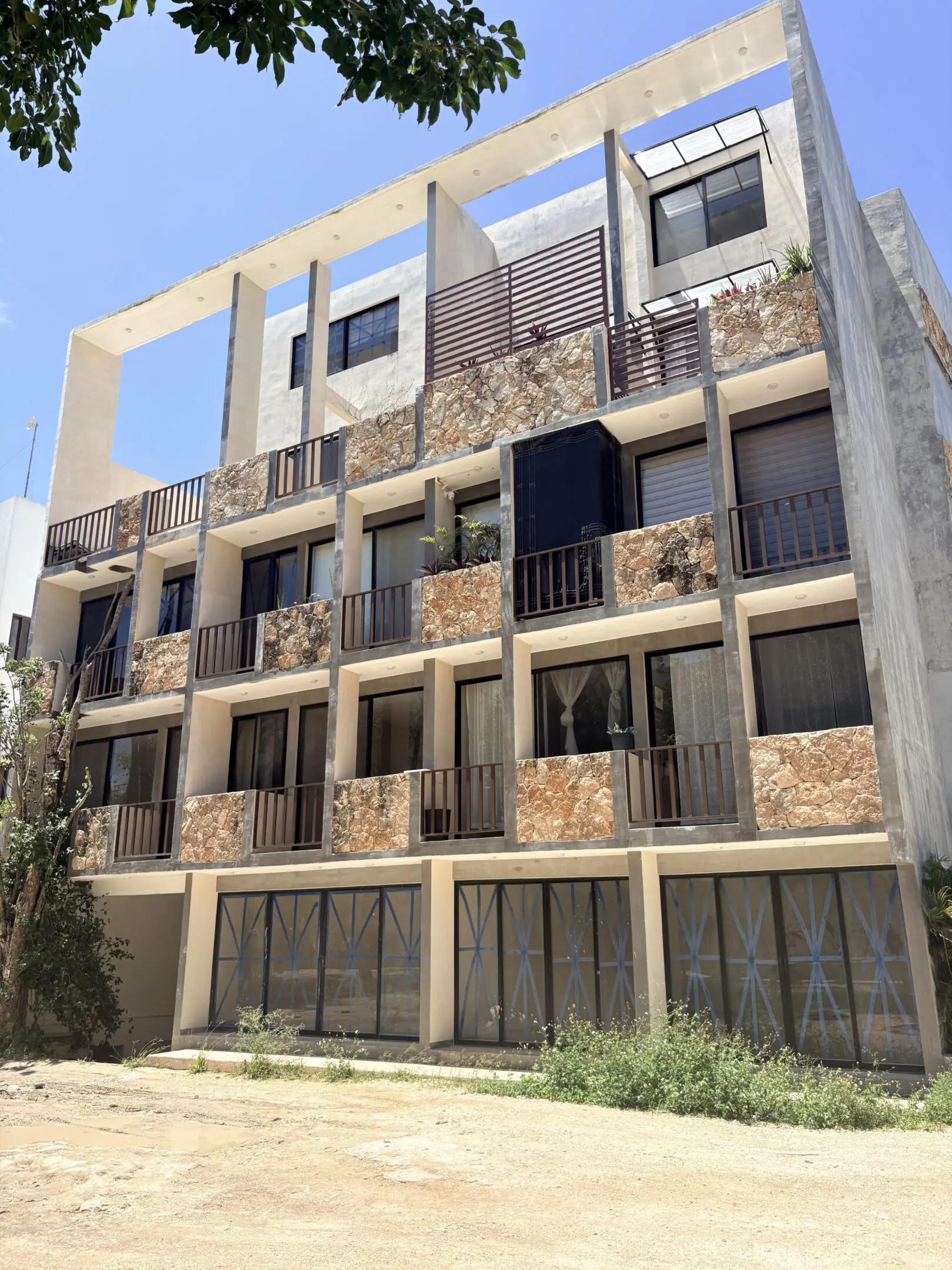 Modern multi-story apartment building with balconies