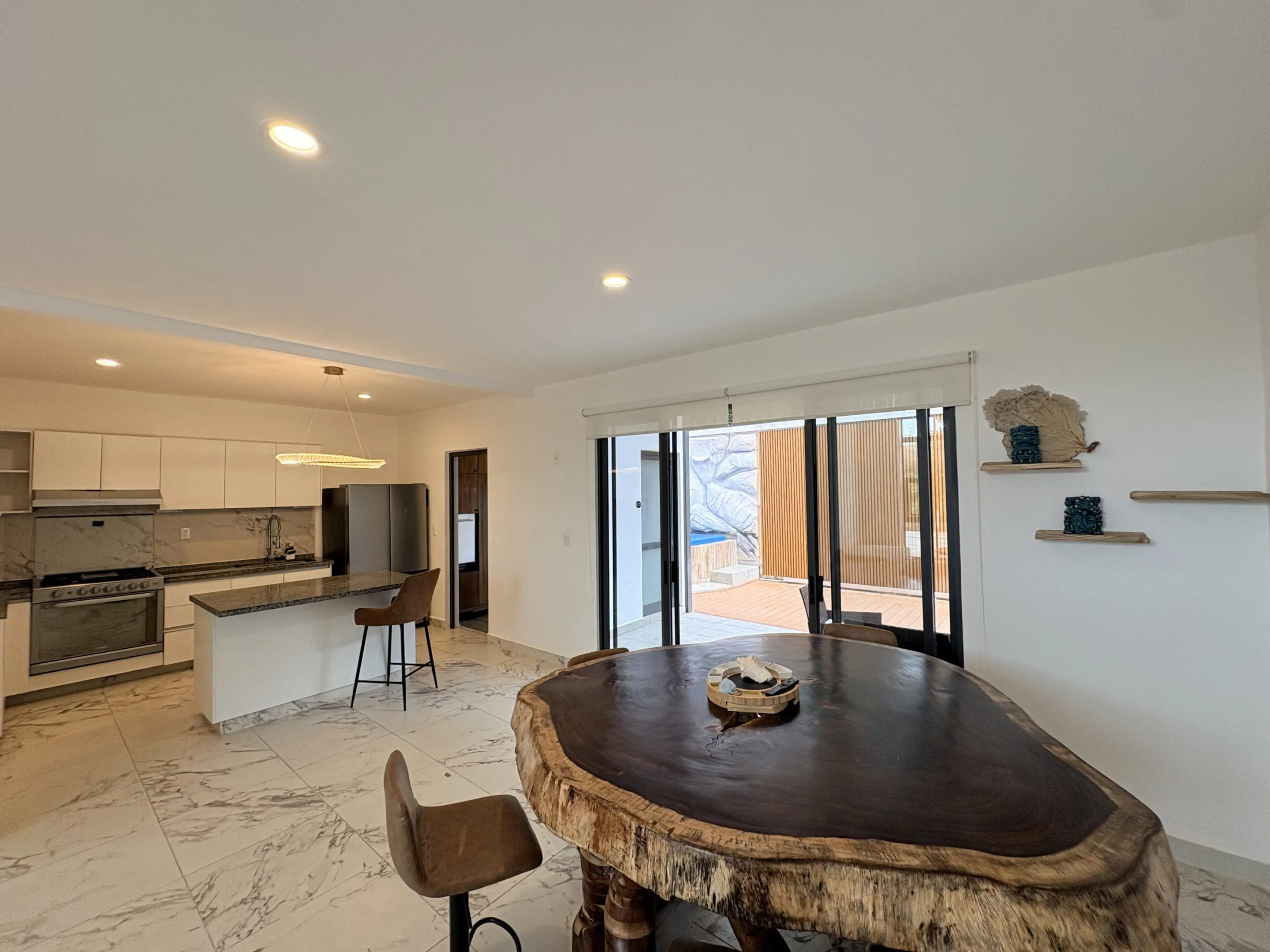 Modern kitchen dining area with live edge table