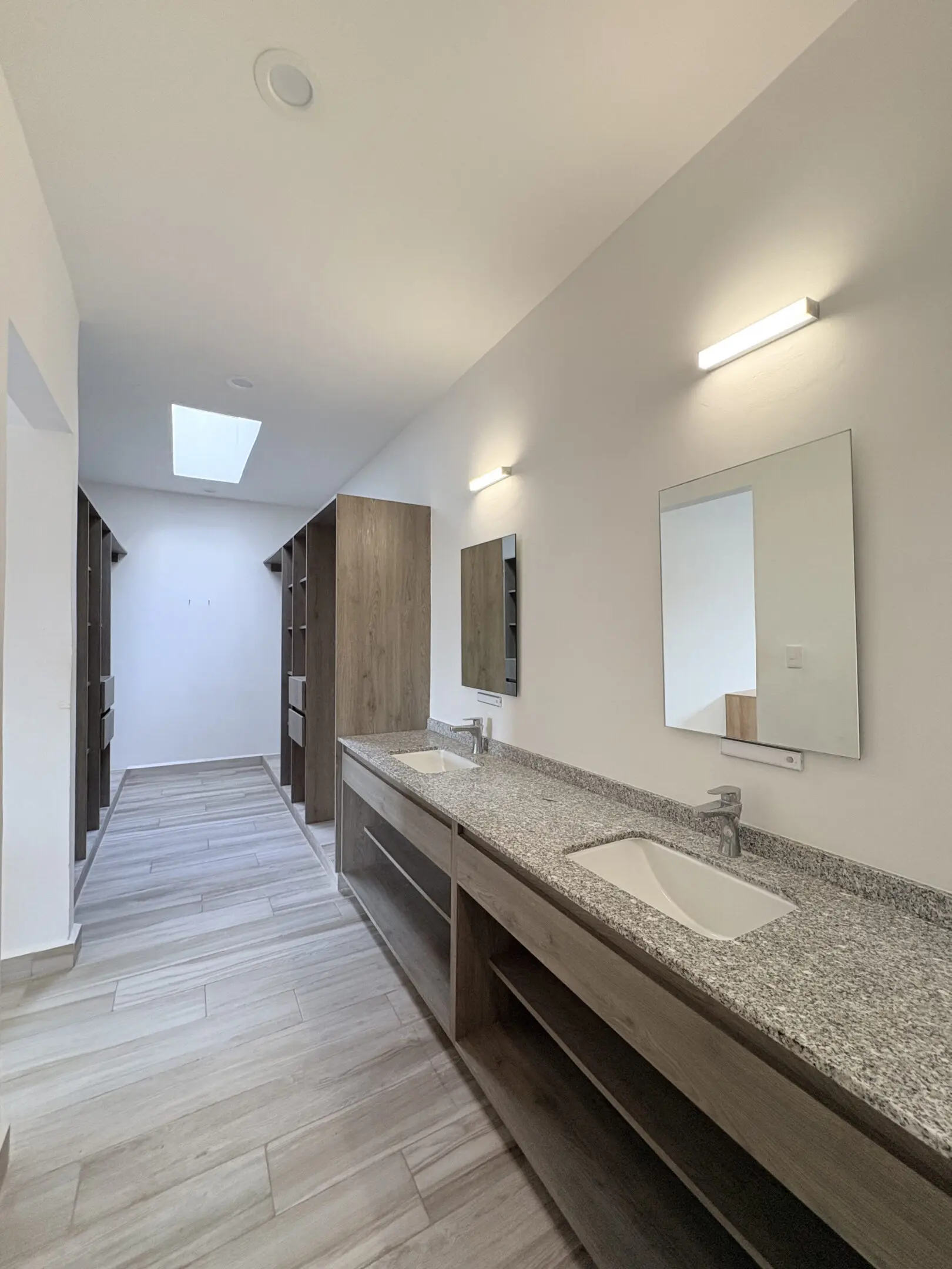 Spacious modern bathroom with double vanity
