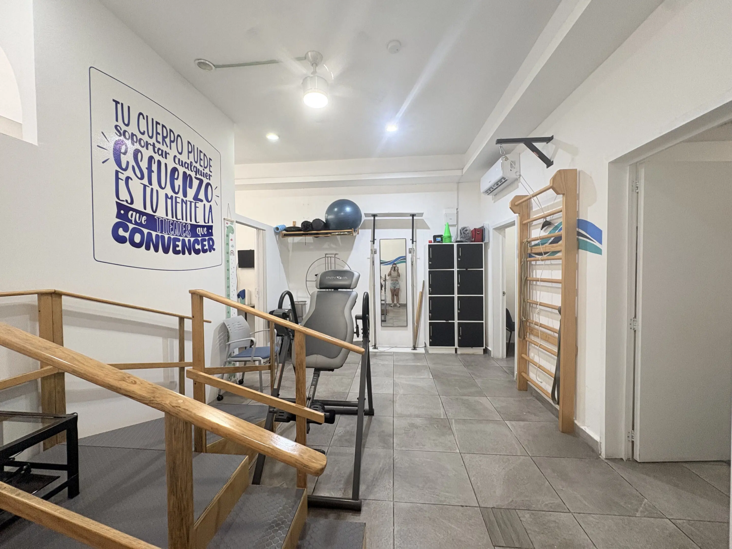 Physical therapy room with parallel bars