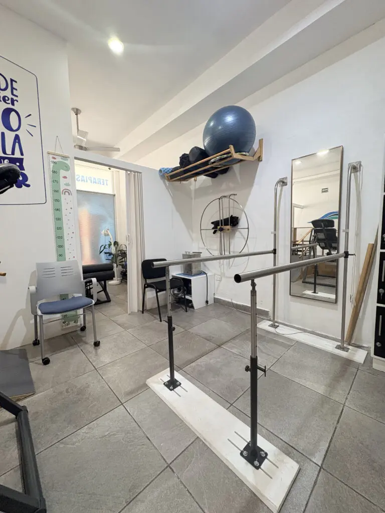 Physical therapy room with parallel bars