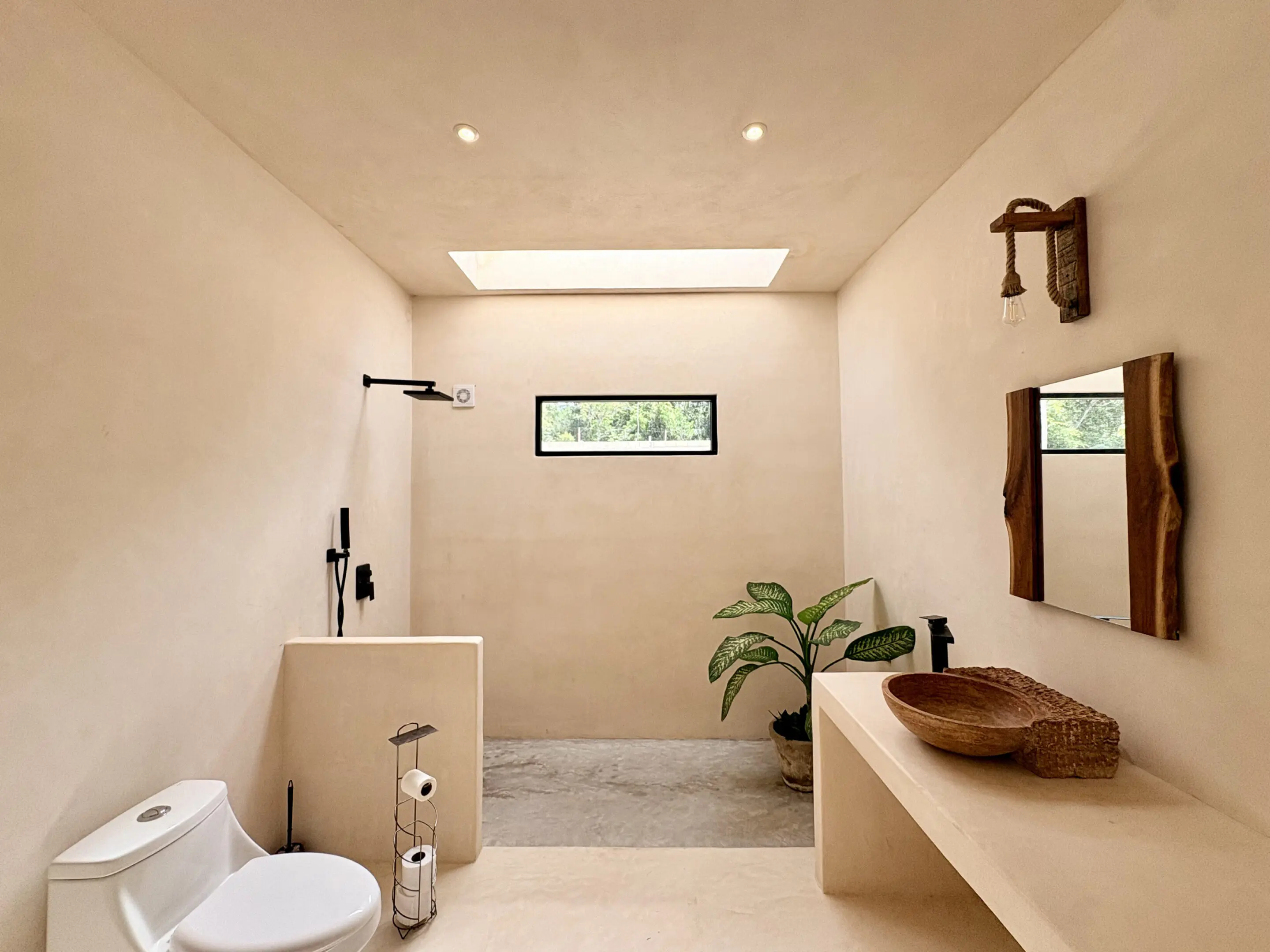 Minimal beige bathroom with walk-in shower