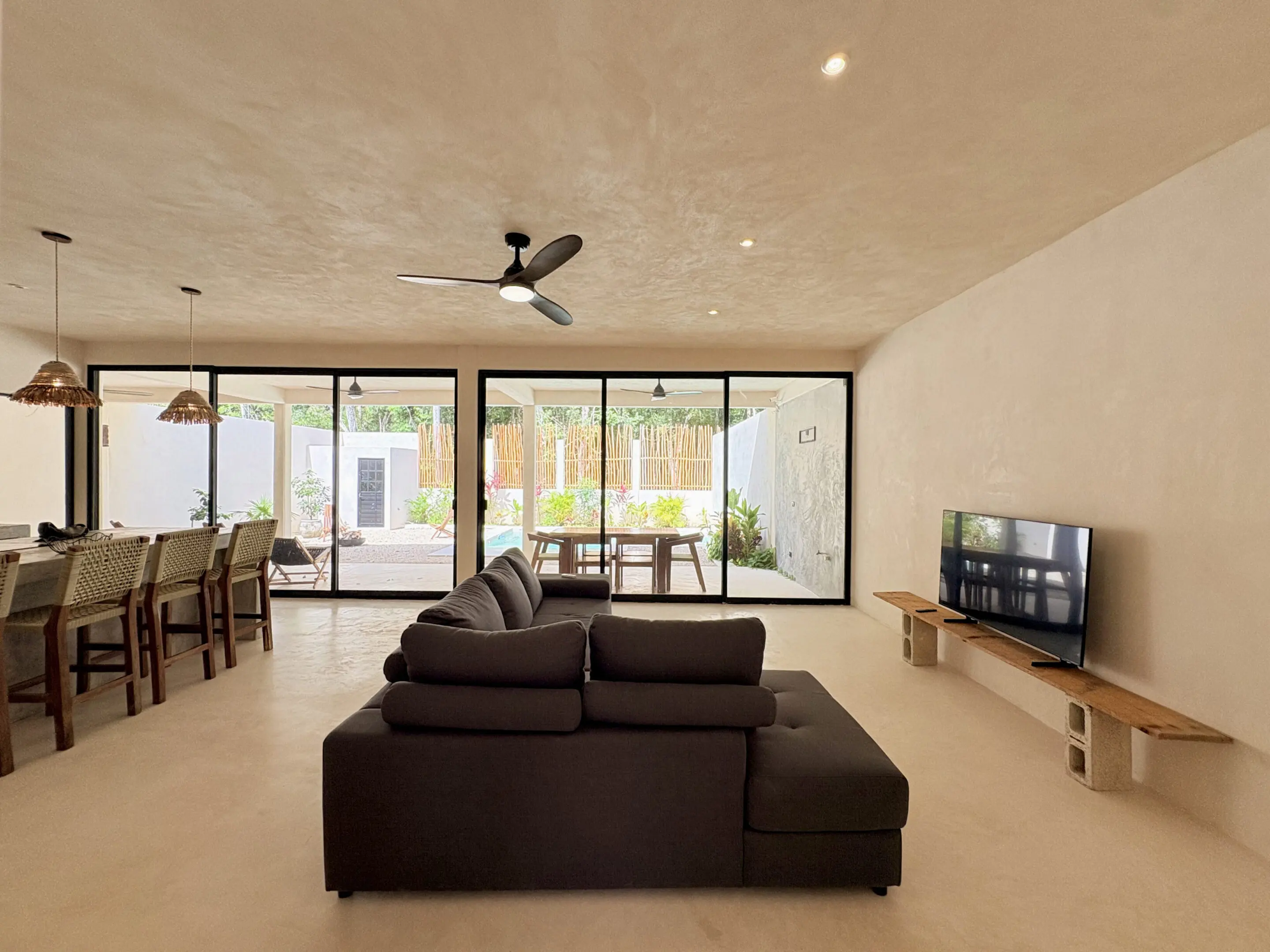 Modern living room with sectional and sliding doors