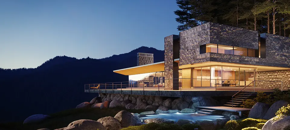 Modern house with mountain view at dusk.