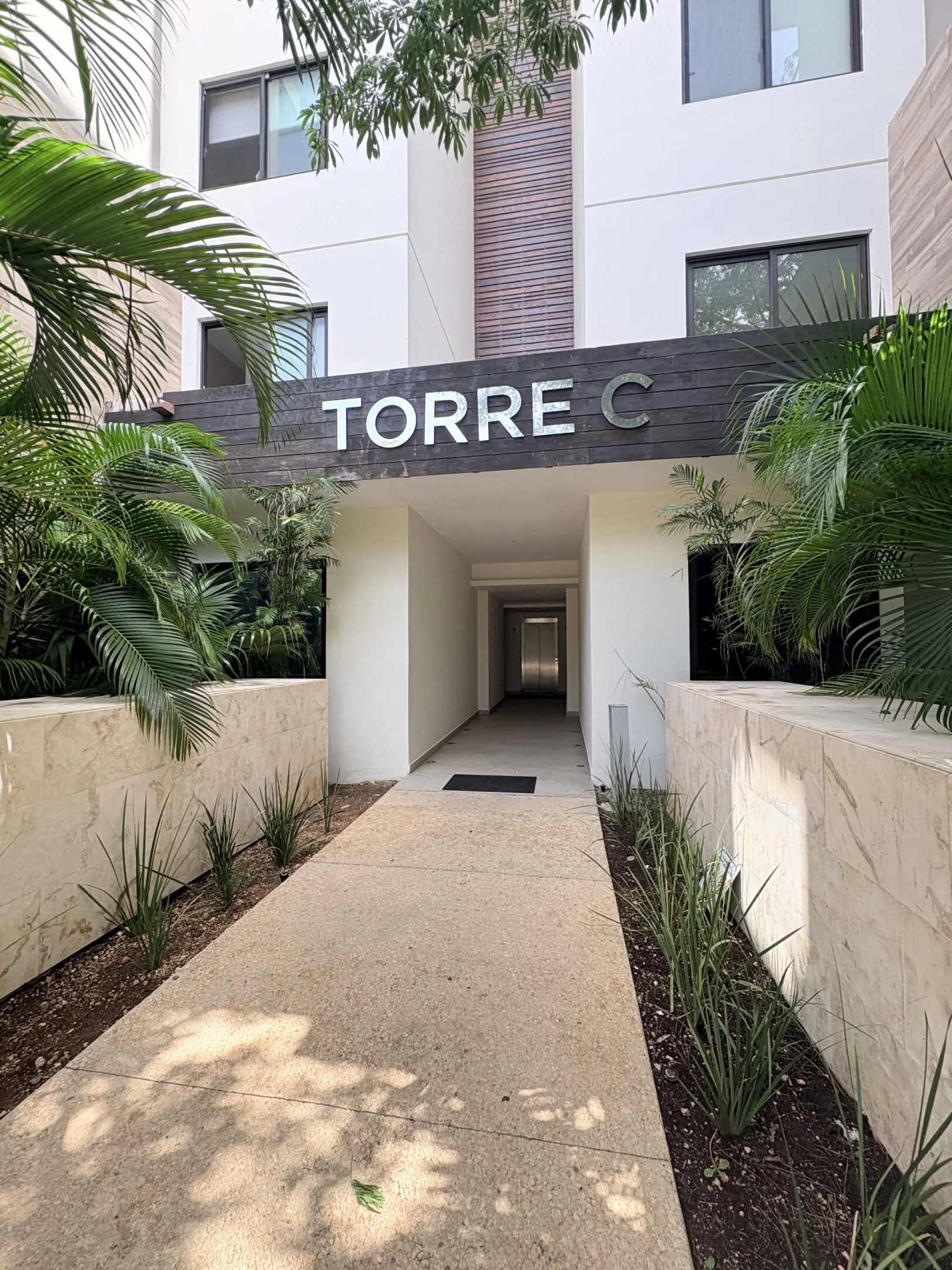 Entrance to Torre C apartment building