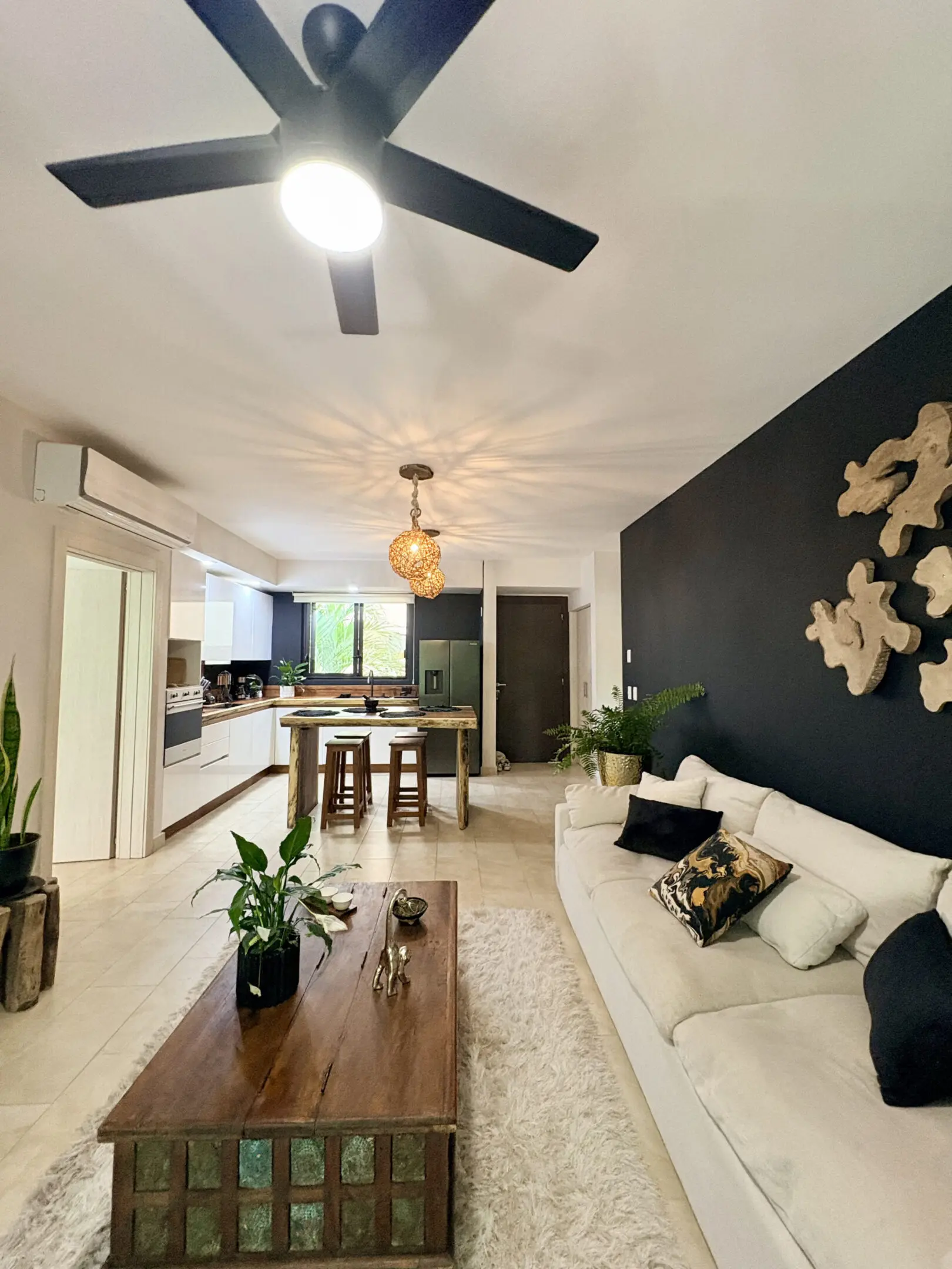 Modern open-plan living room with kitchen