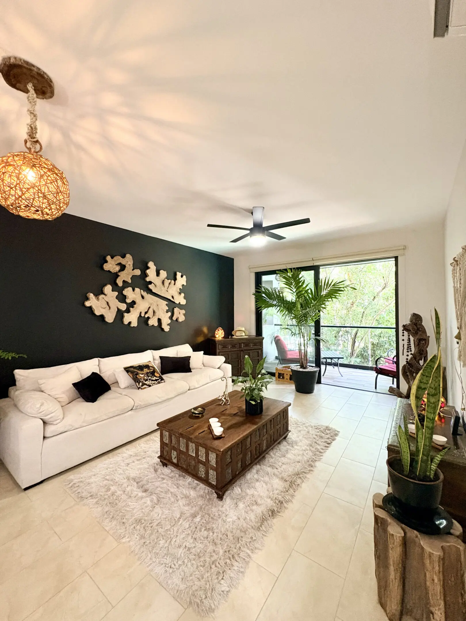 Bright modern living room with white sofa