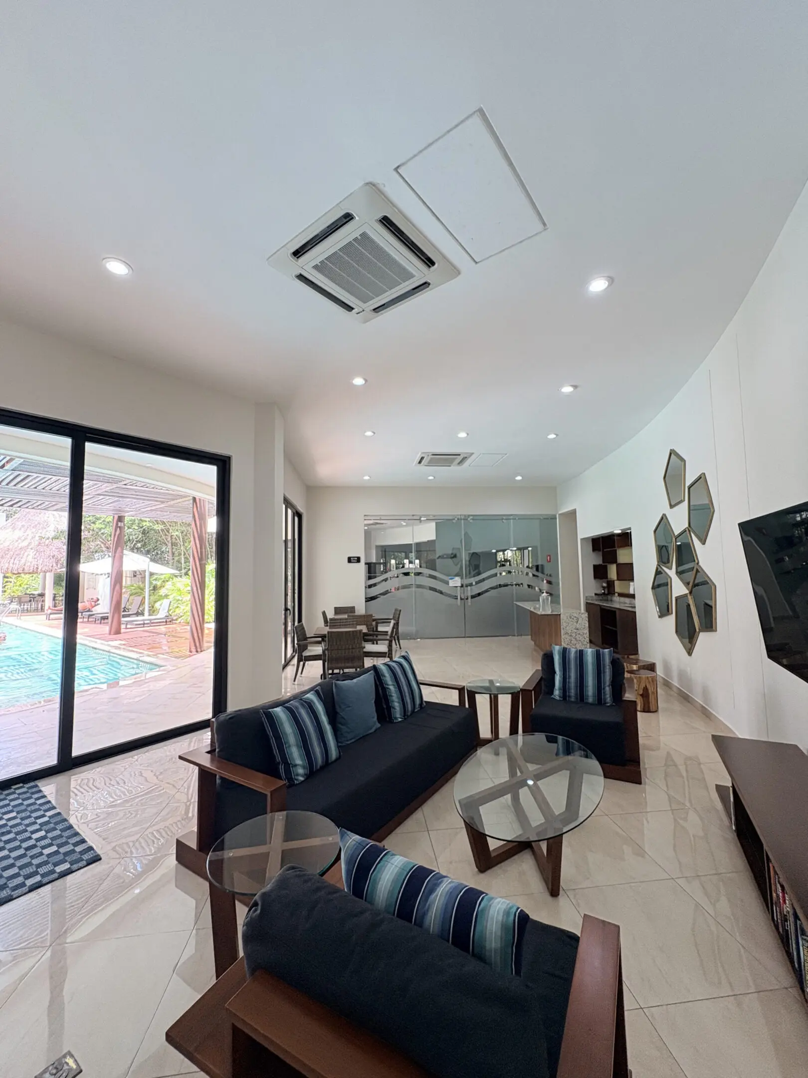 Modern living room with pool view
