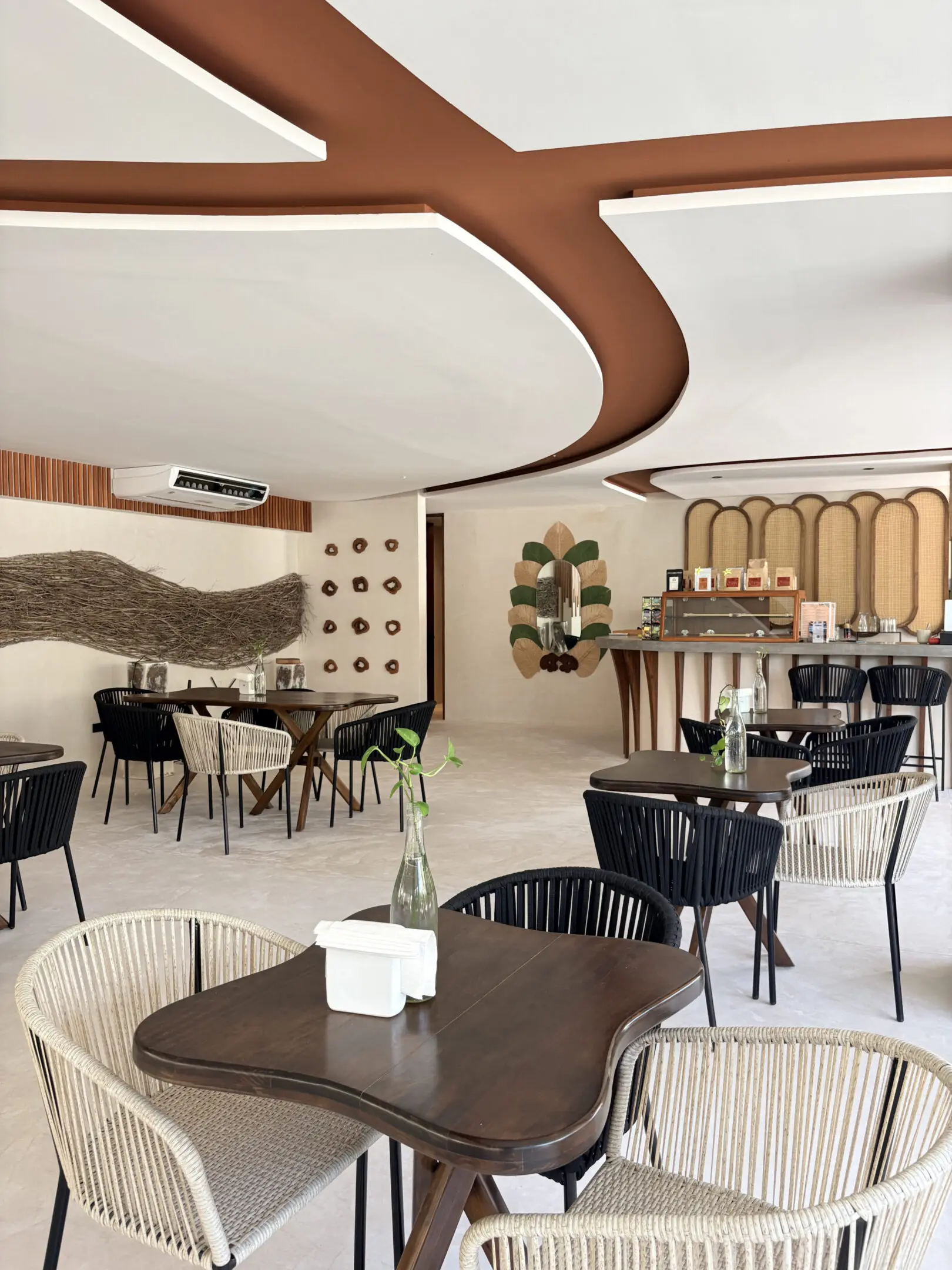 Modern cafe interior with curved ceiling