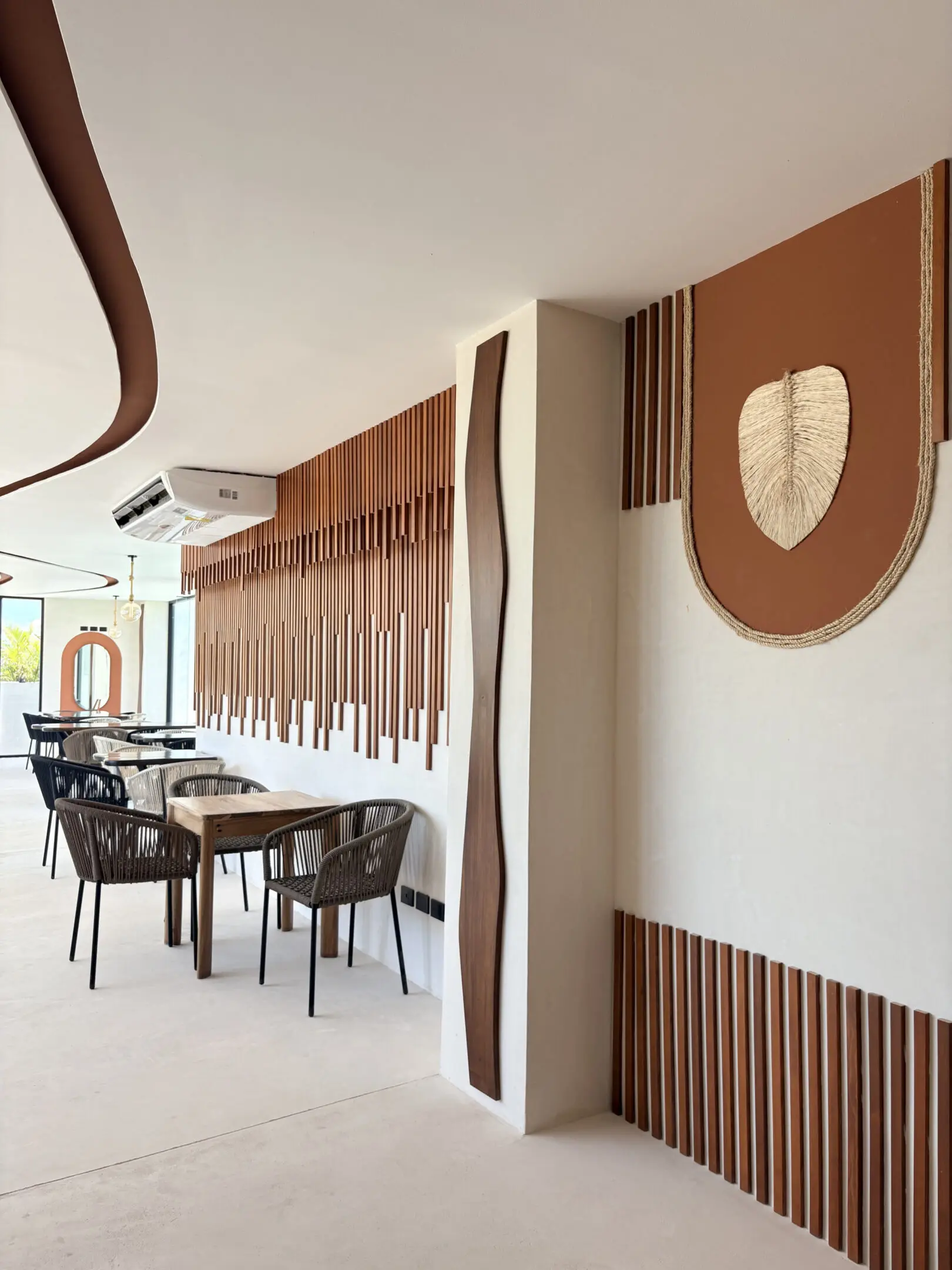 Modern cafe interior with wooden slat decor
