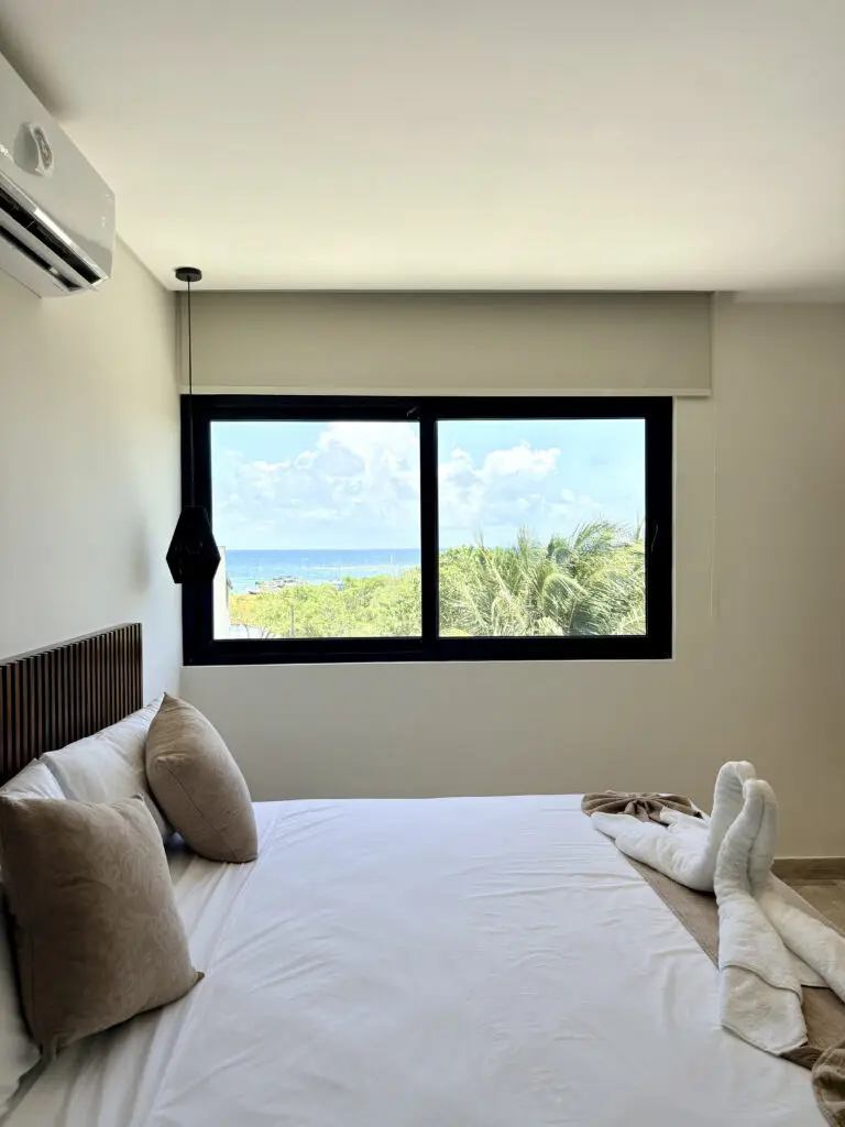 Minimal bedroom with ocean view window