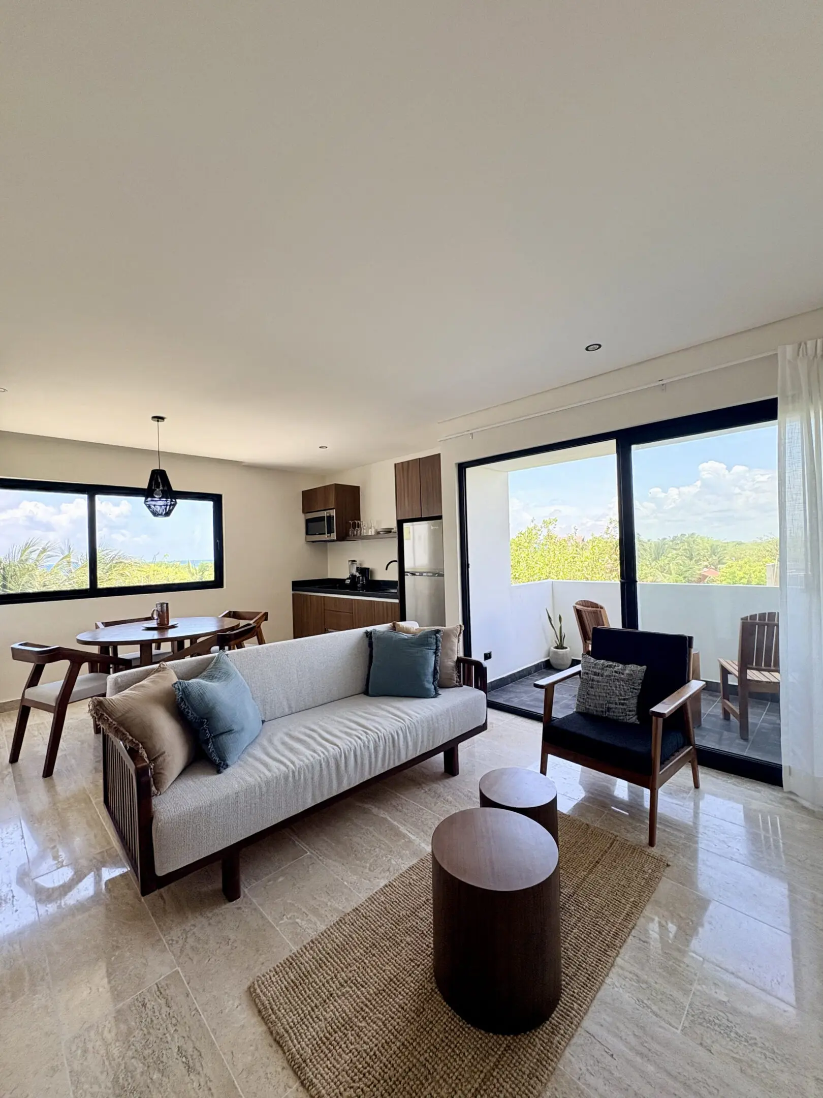 Bright modern living room with balcony view