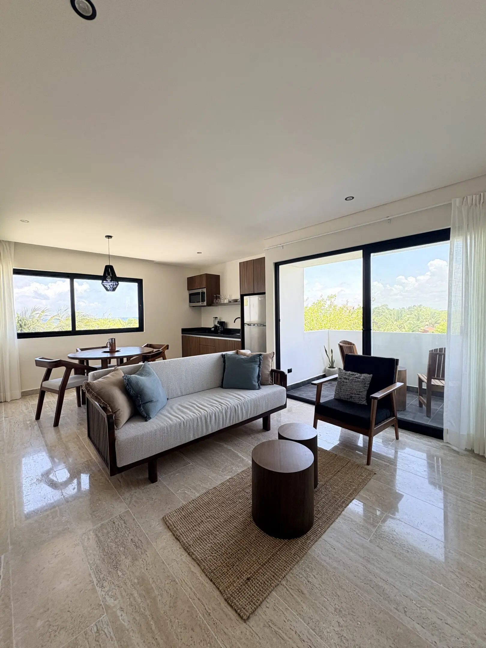 Bright modern living room with balcony view