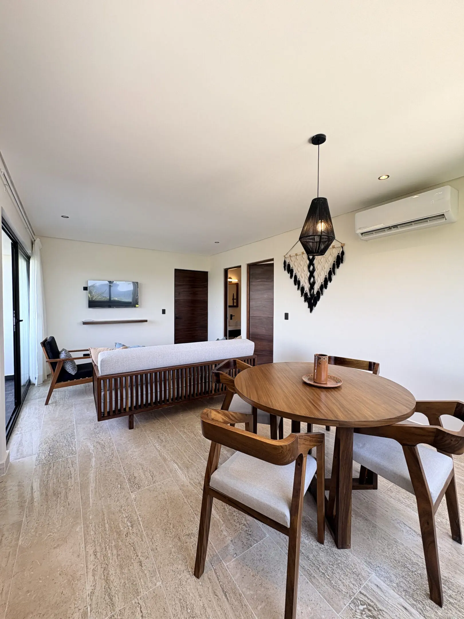 Modern living-dining room with wooden furniture