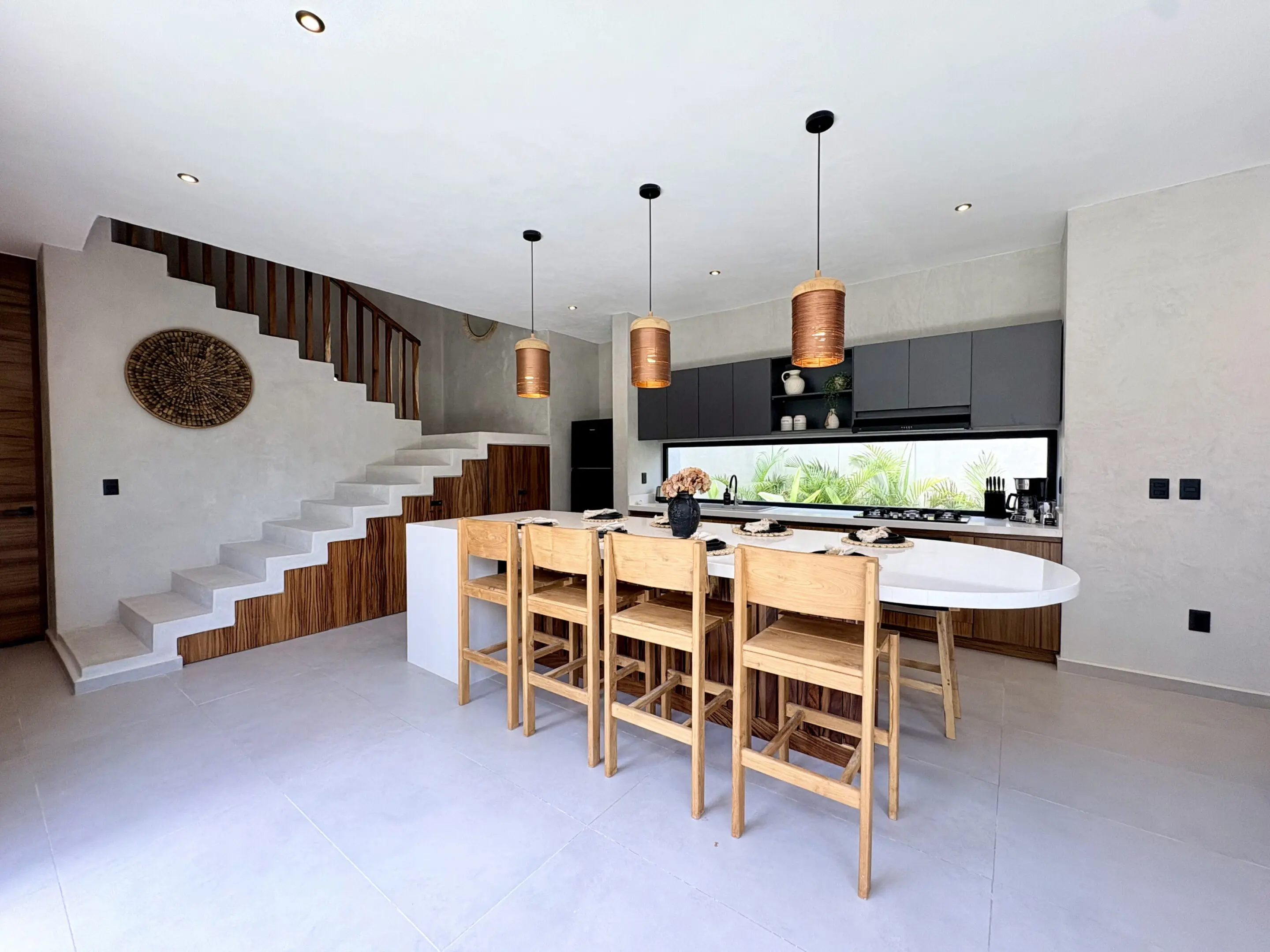 Modern kitchen with island and wooden stools
