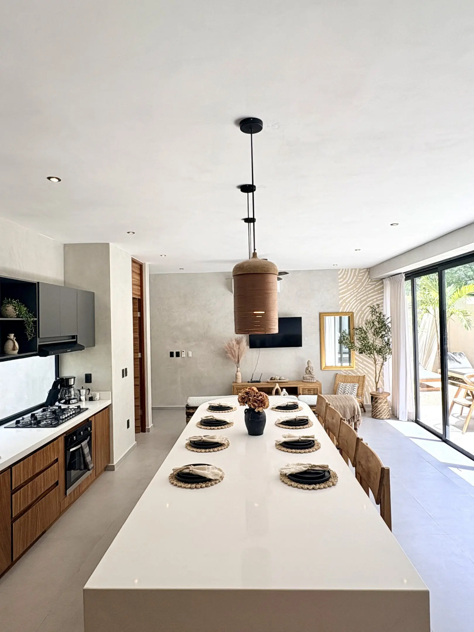 Bright modern kitchen island with place settings