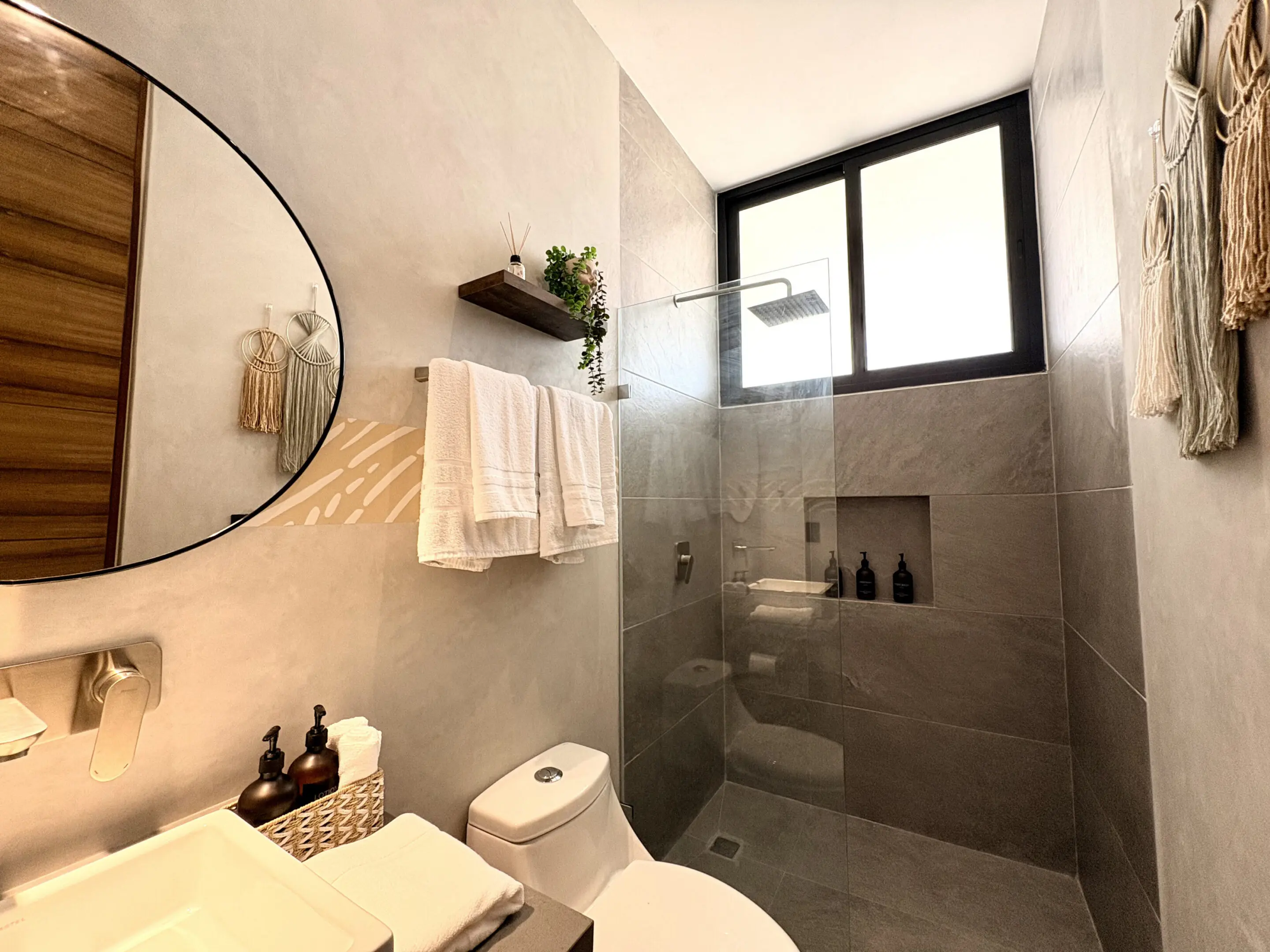 Modern bathroom with glass shower and toilet