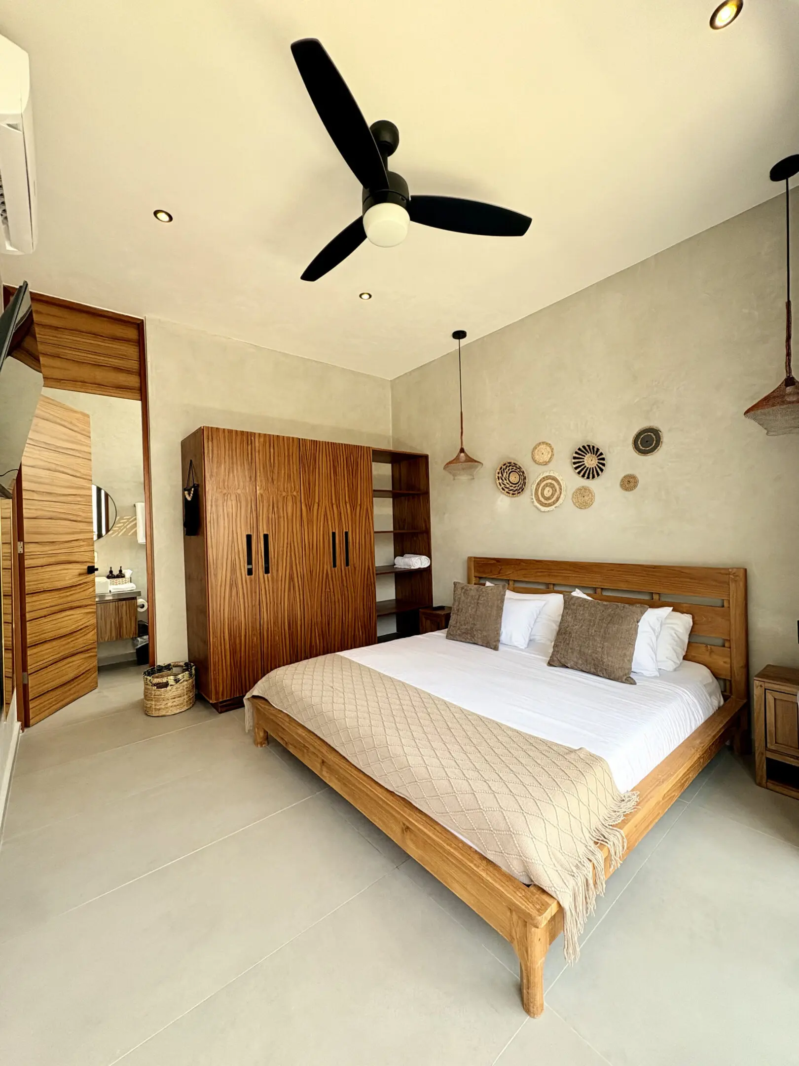 Modern wooden bedroom with ceiling fan