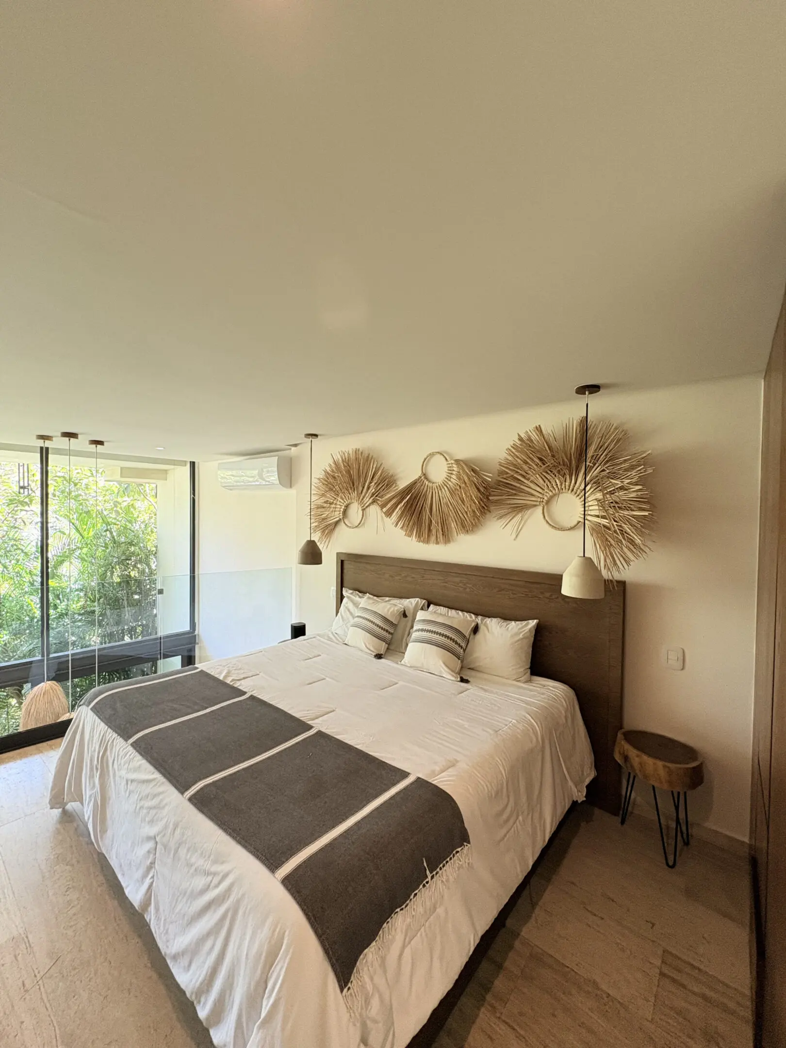 Modern boho bedroom with large bed