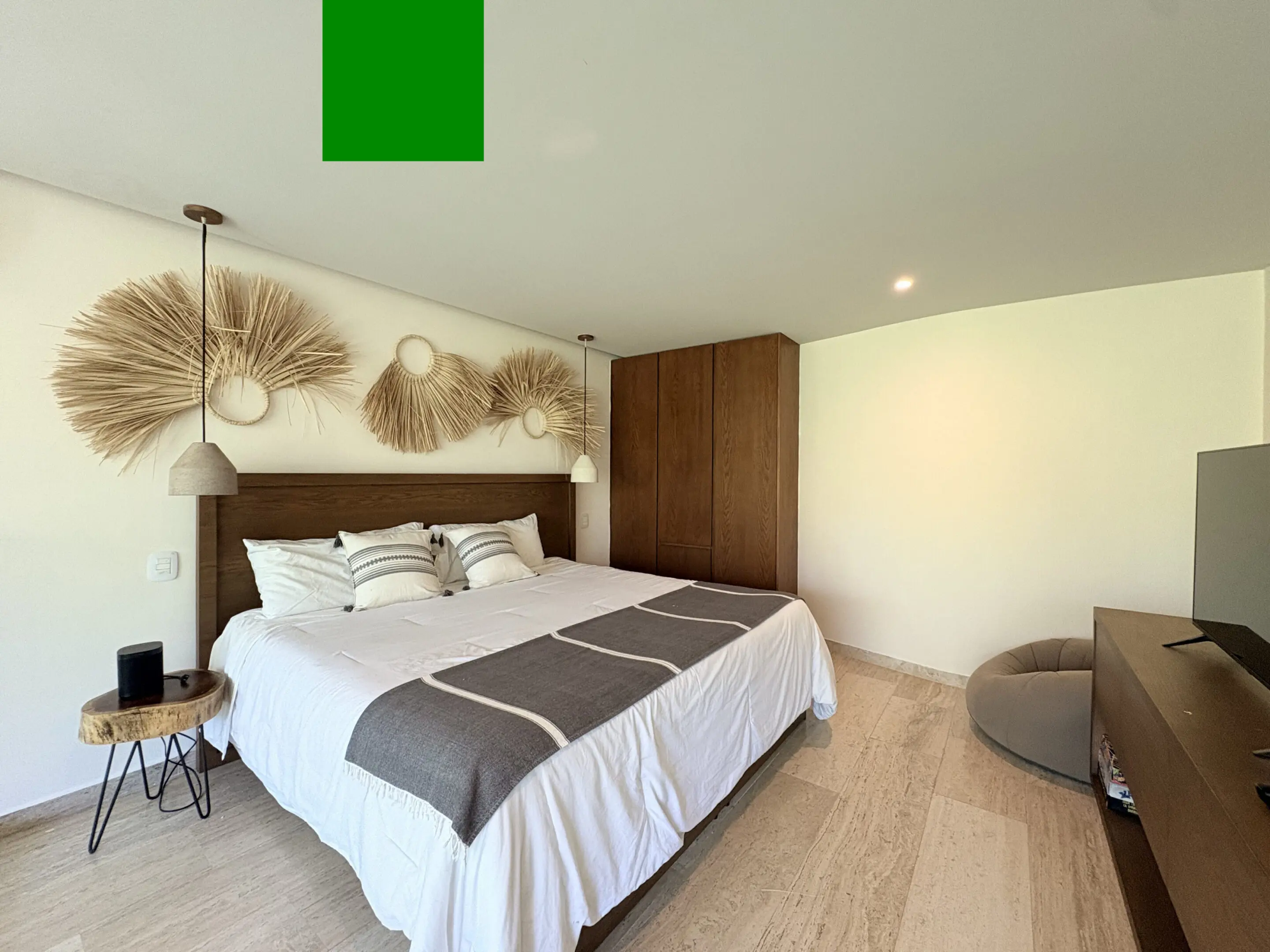 Contemporary bedroom with woven wall decor