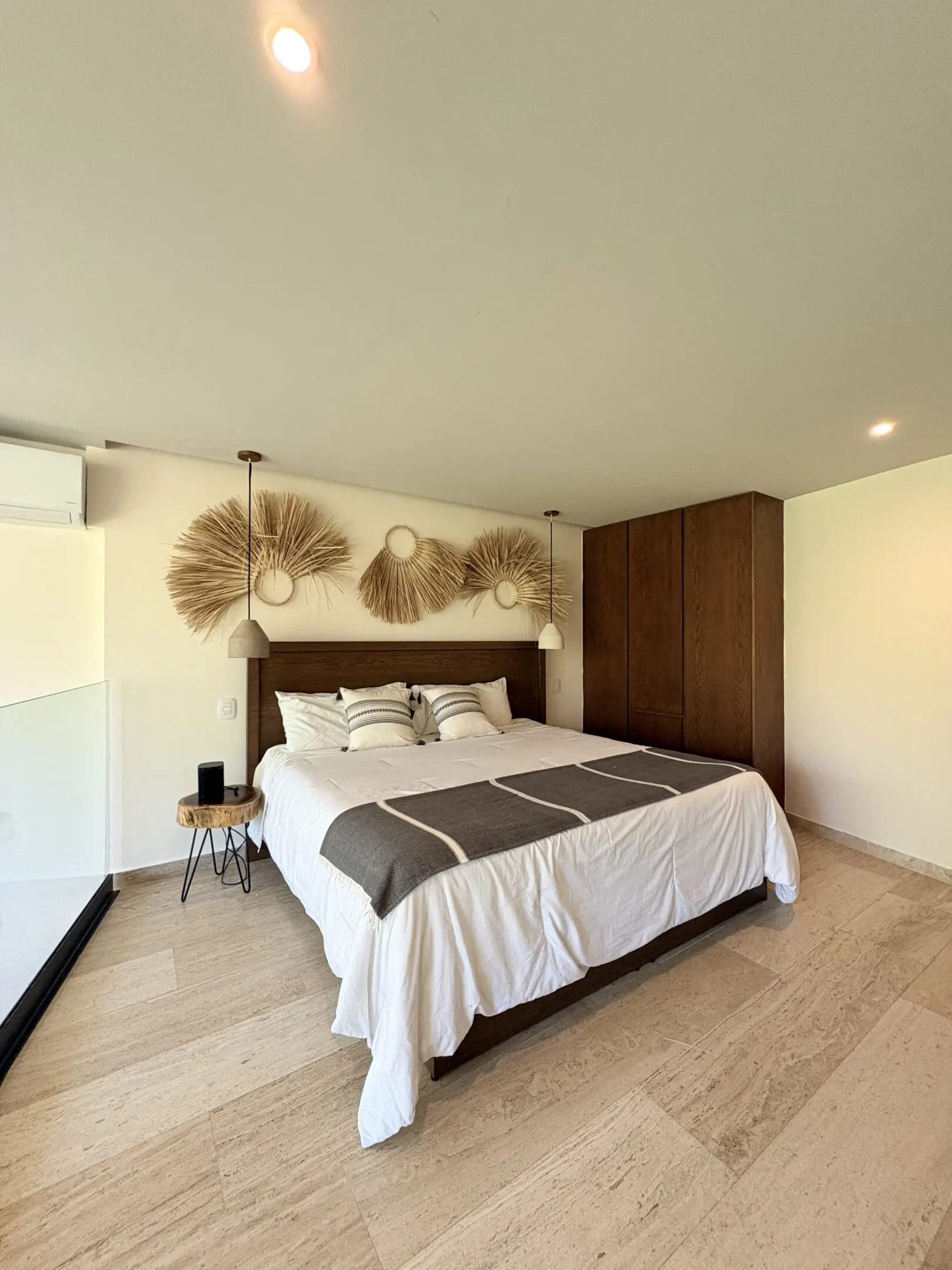 Modern bedroom with king bed and wall art