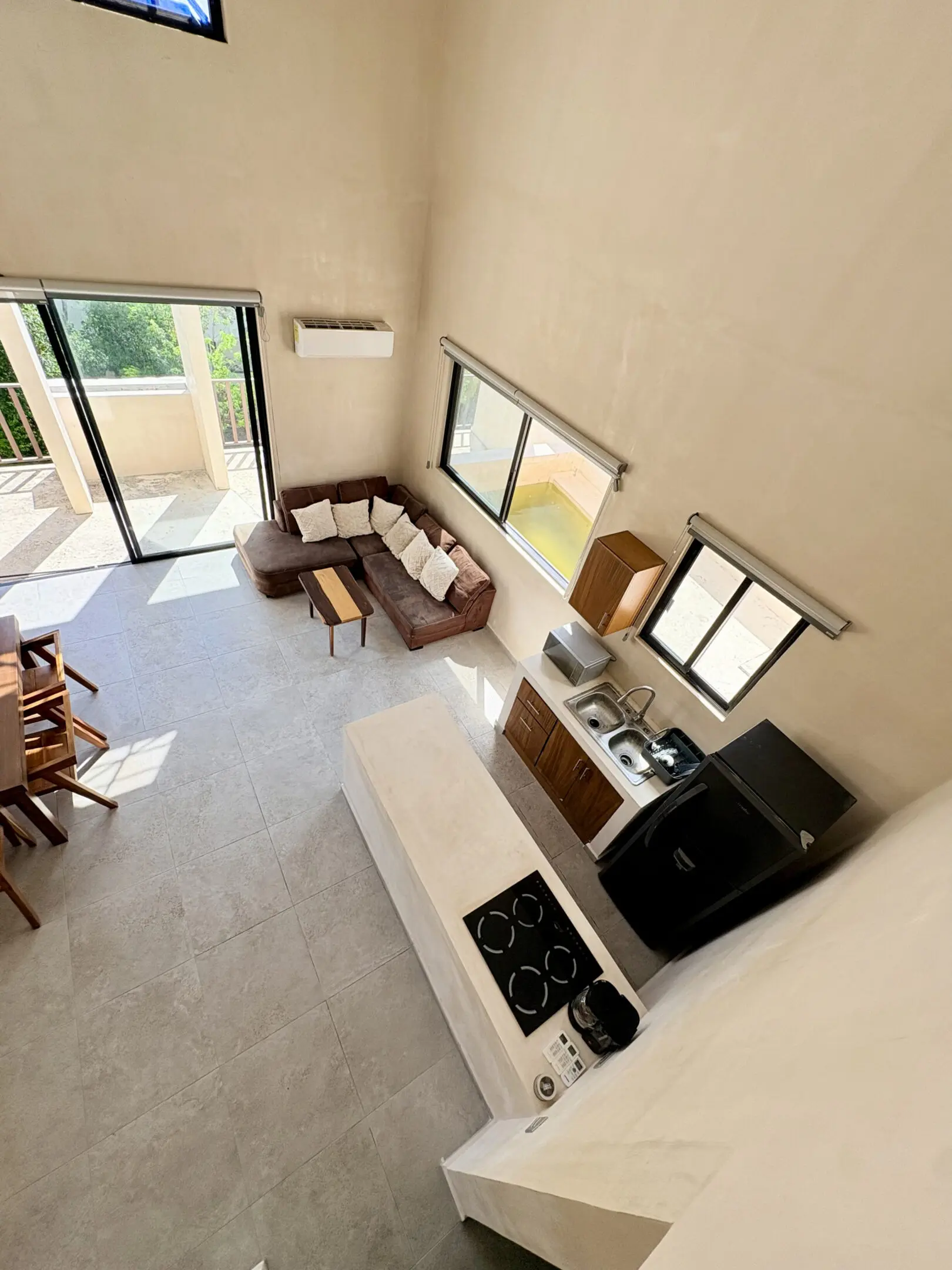 Aerial view of open-plan kitchen and living room