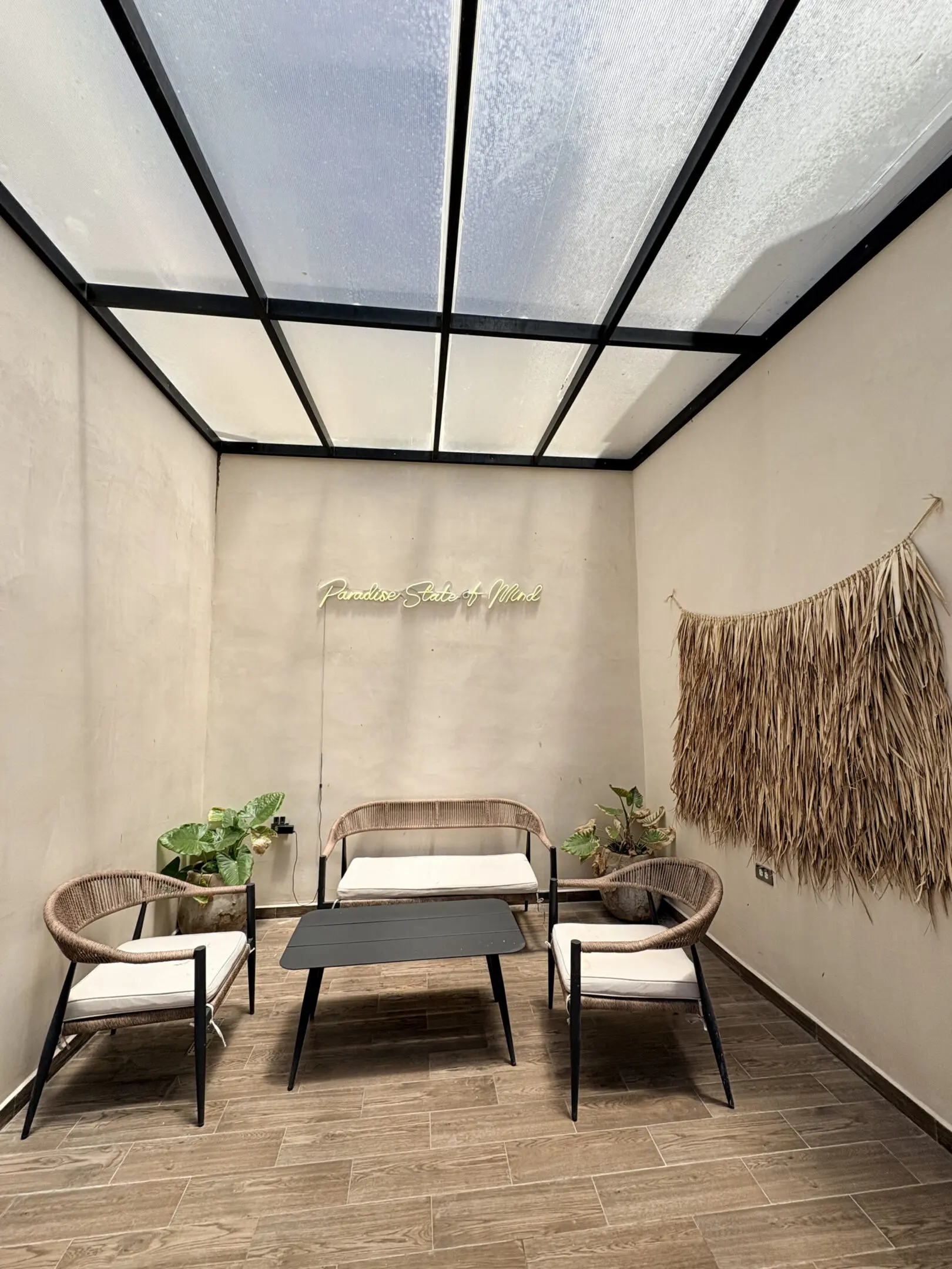 Sunlit indoor seating area with skylight
