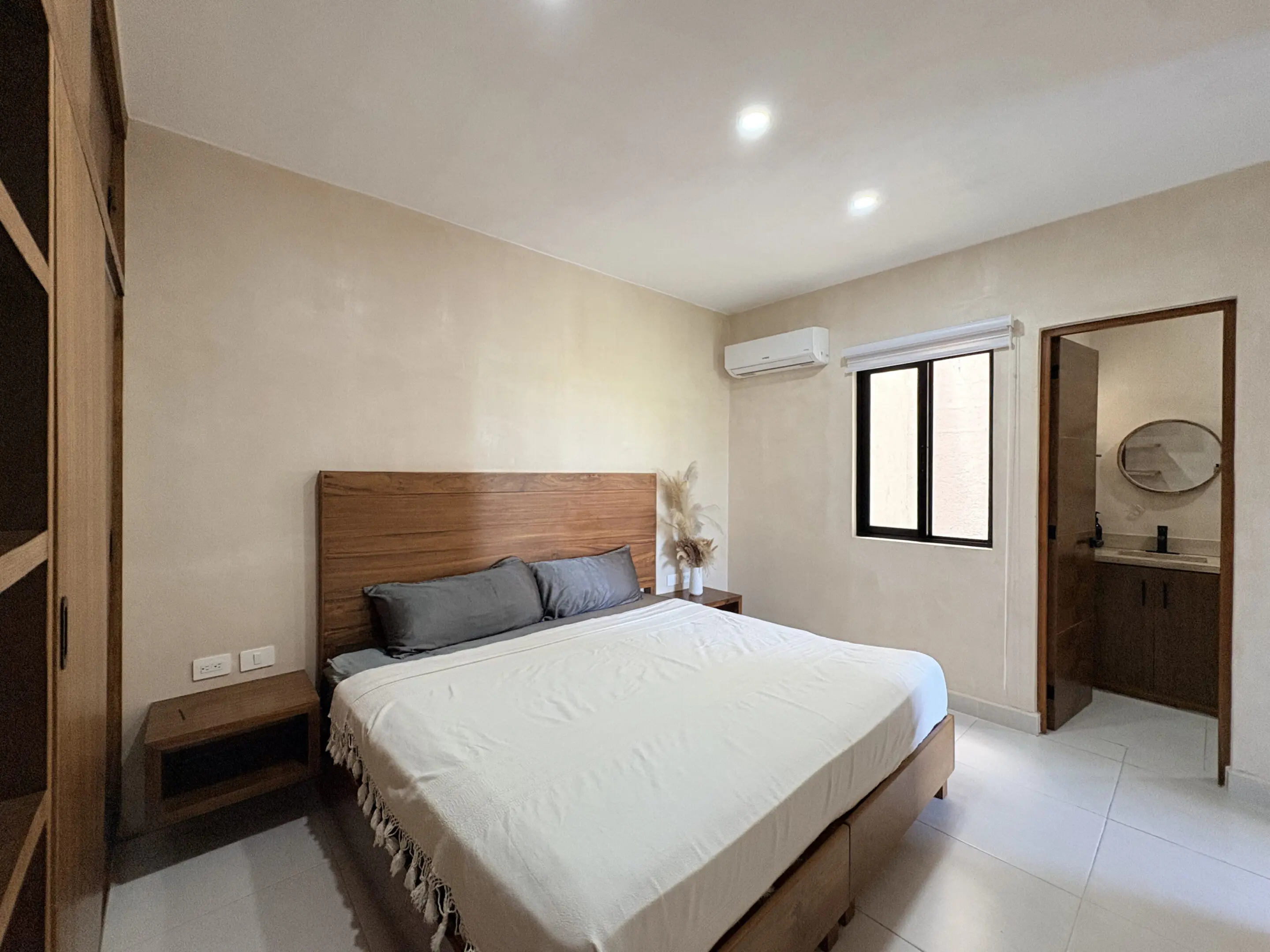 Minimal modern bedroom with ensuite bathroom