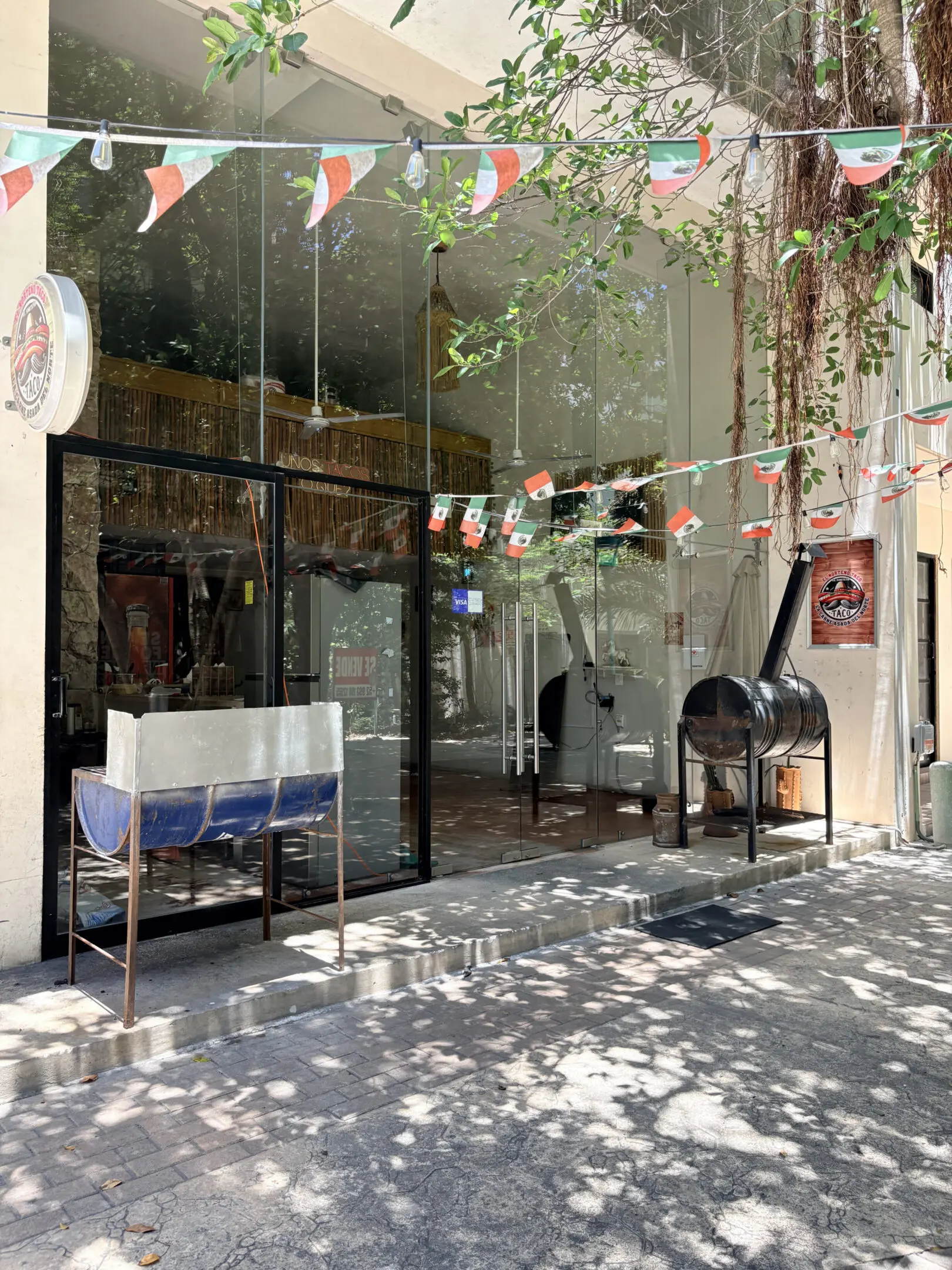 Mexican restaurant storefront with outdoor grill