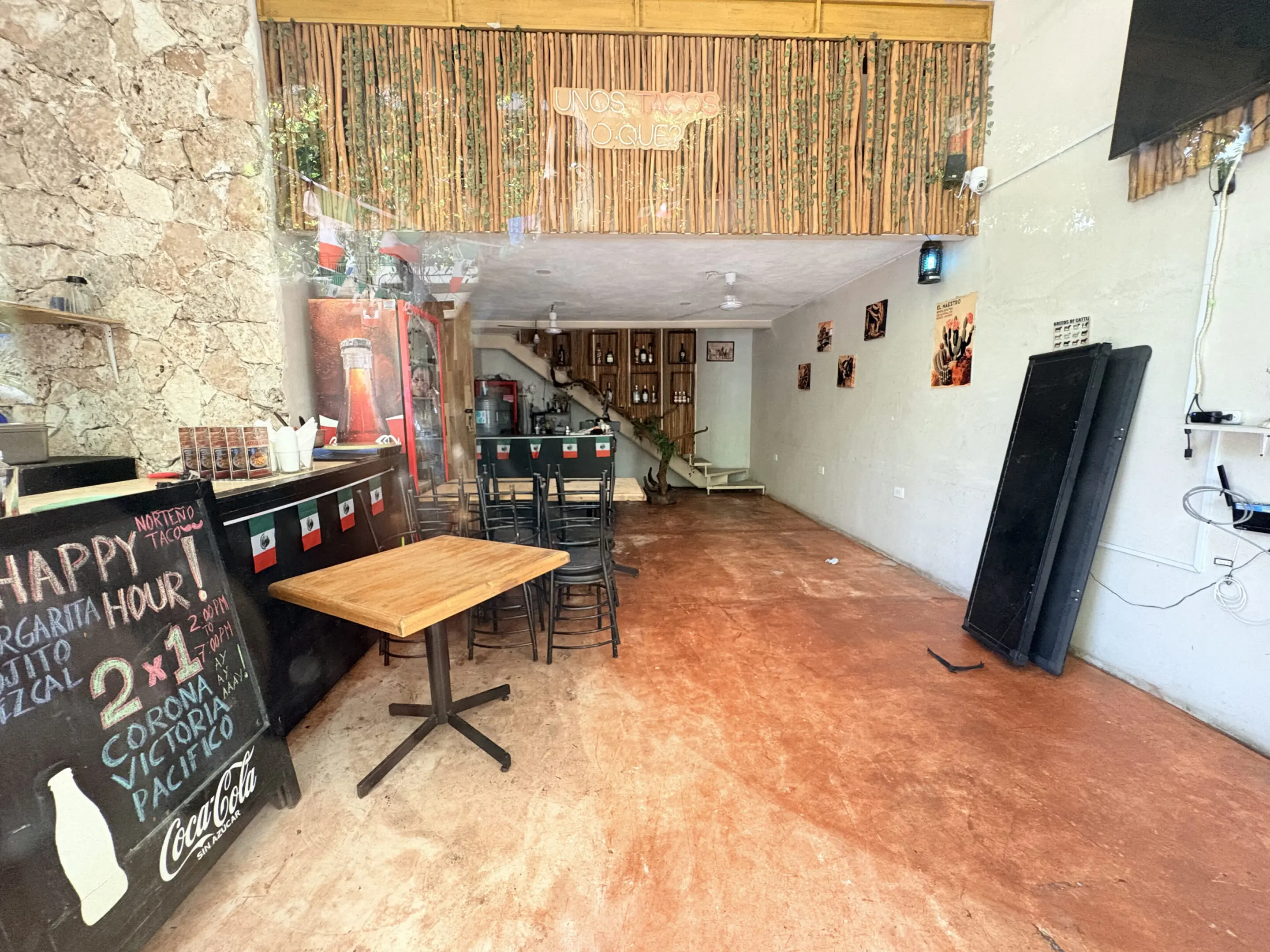 Cozy empty bar interior with chalkboard sign