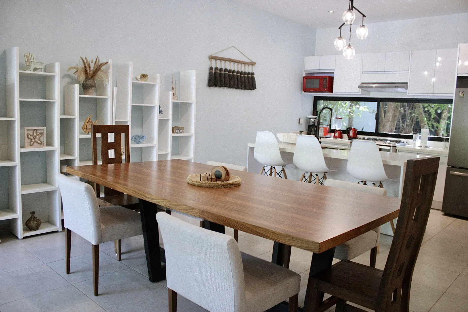 Modern open-plan dining room with wooden table