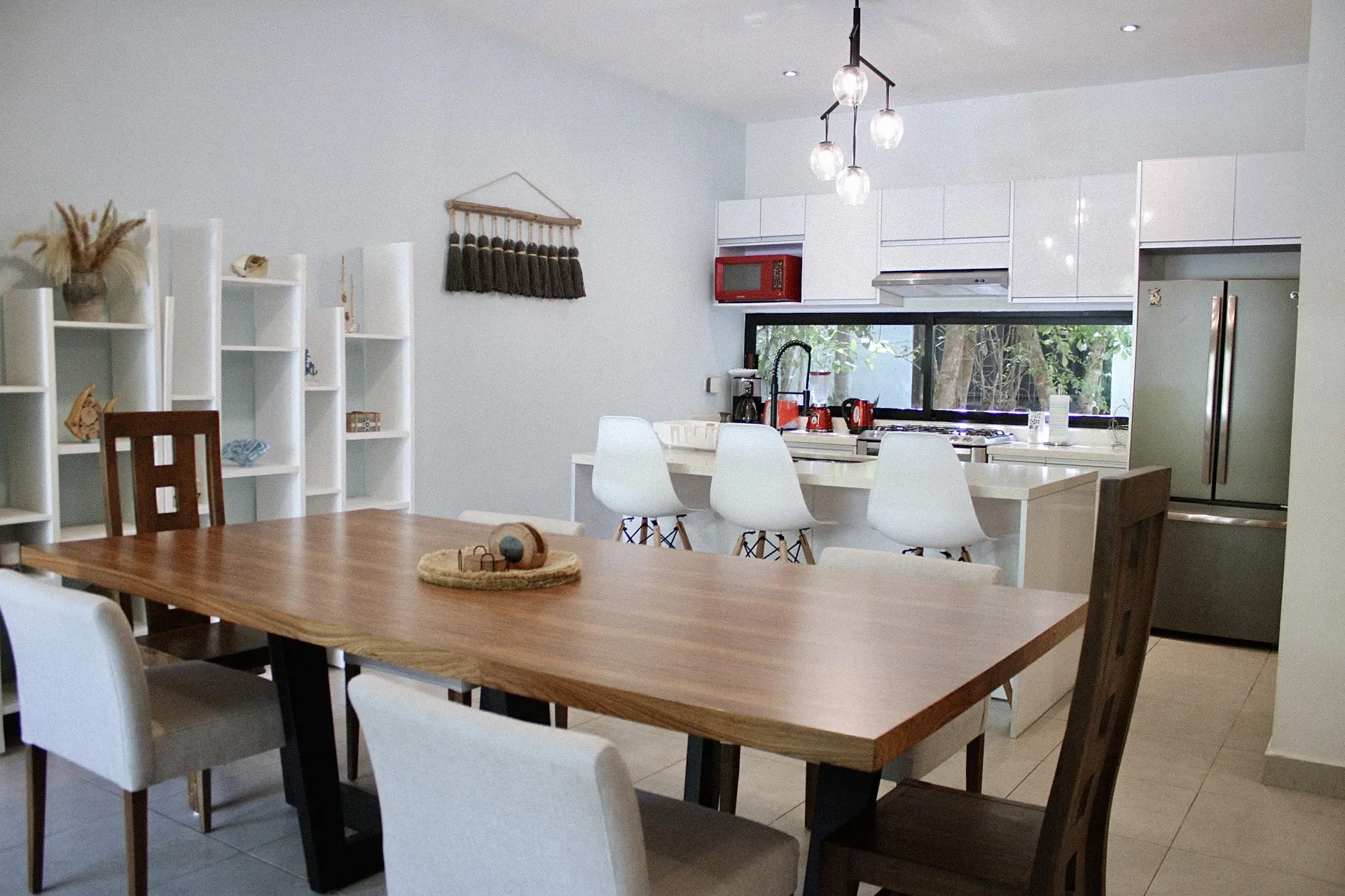 Modern kitchen with wooden dining table
