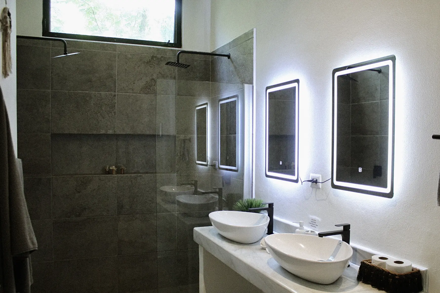 Modern bathroom with double vessel sinks
