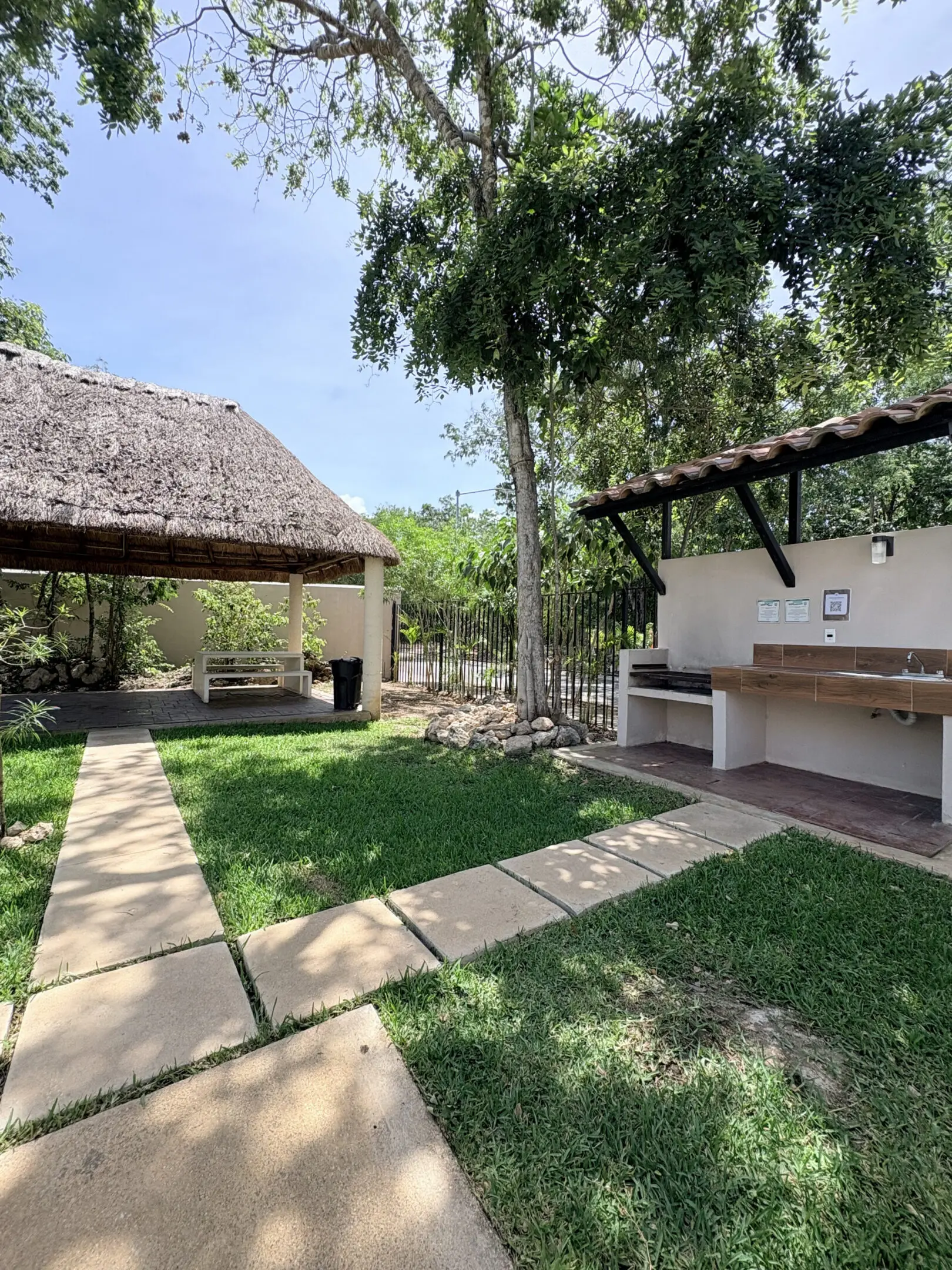 Thatched palapa with outdoor BBQ and sinks