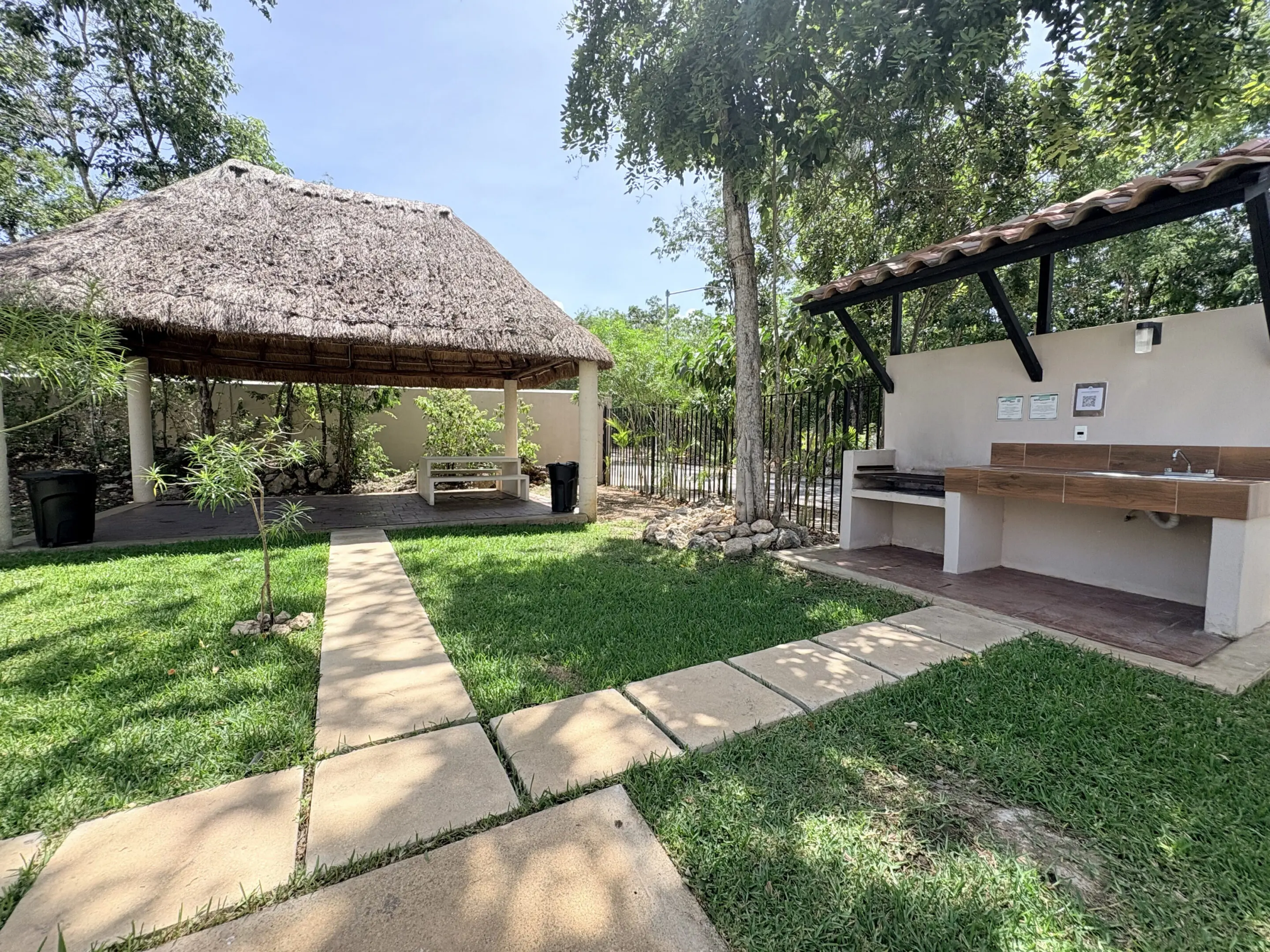 Thatched palapa and outdoor barbecue area