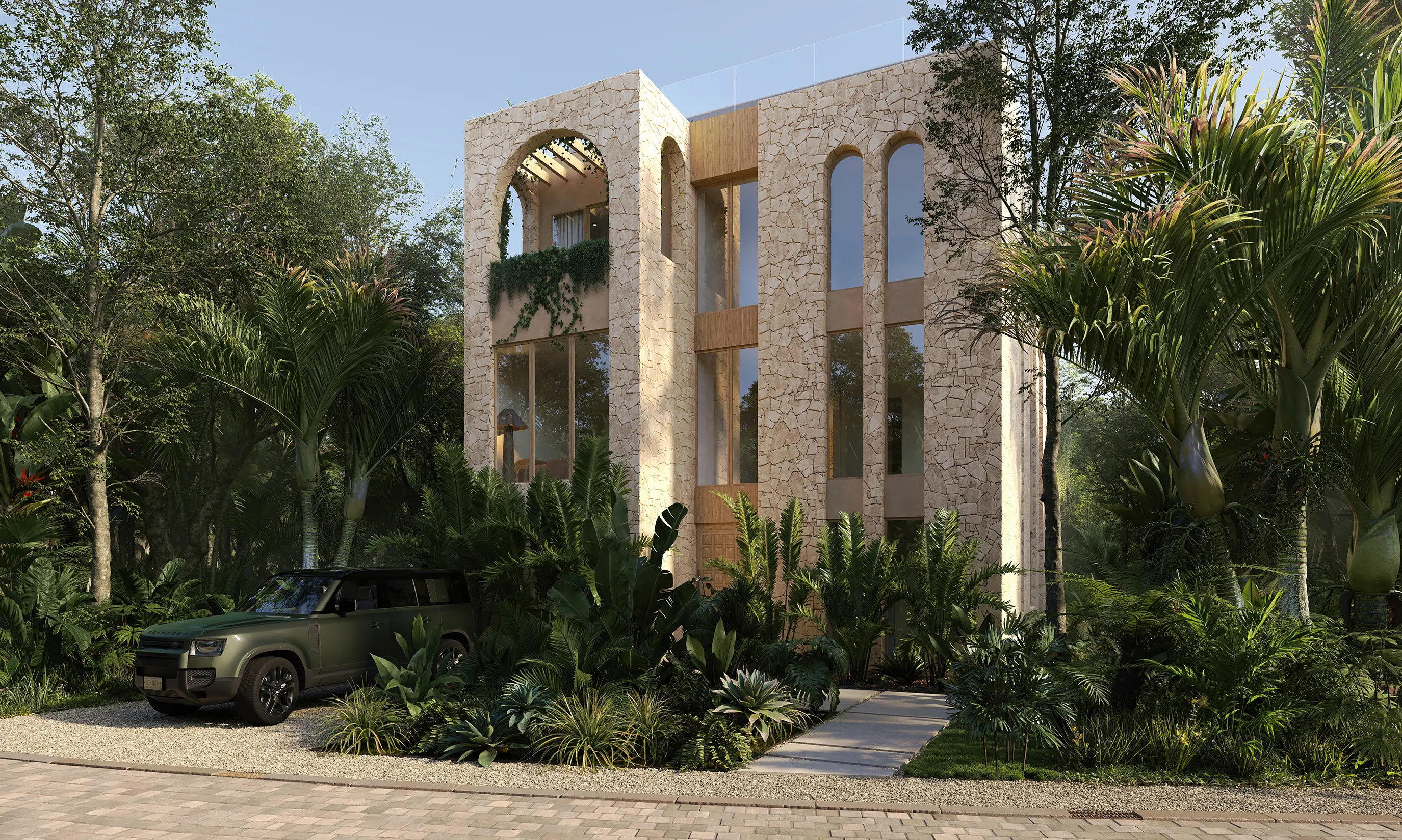 Modern stone villa surrounded by tropical foliage