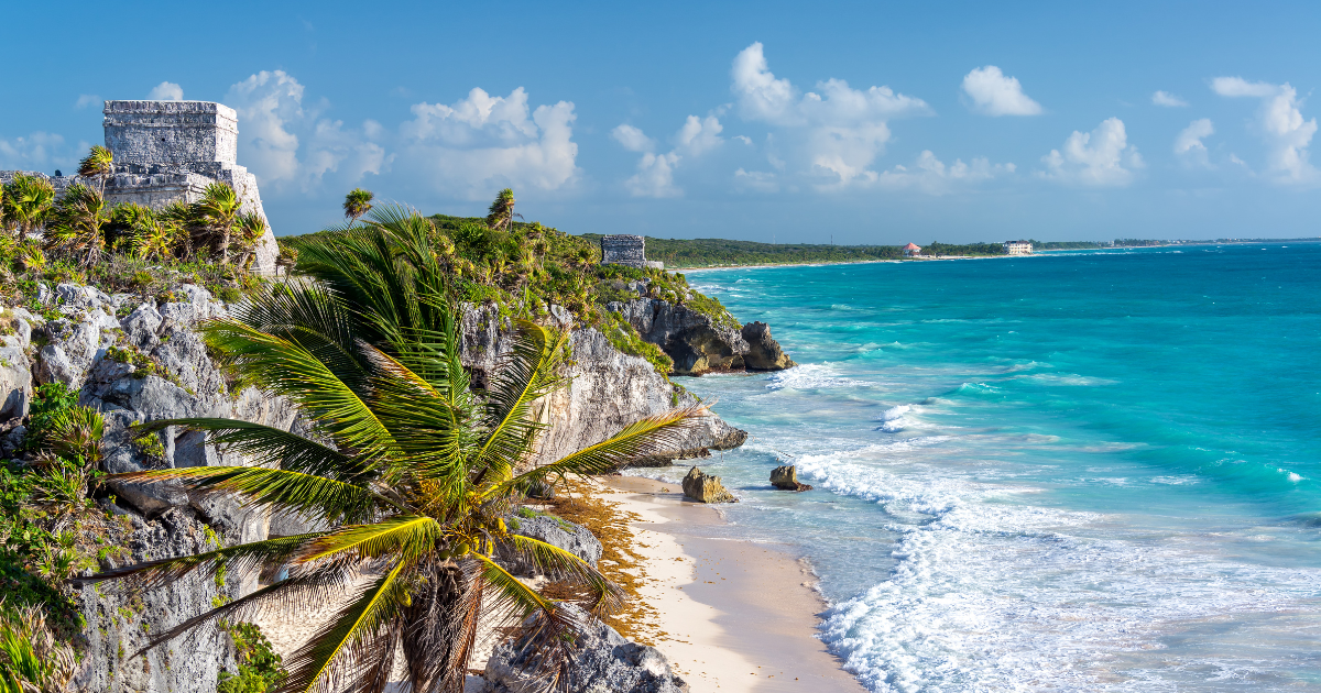 Tulum ruins on Caribbean cliff overlooking beach