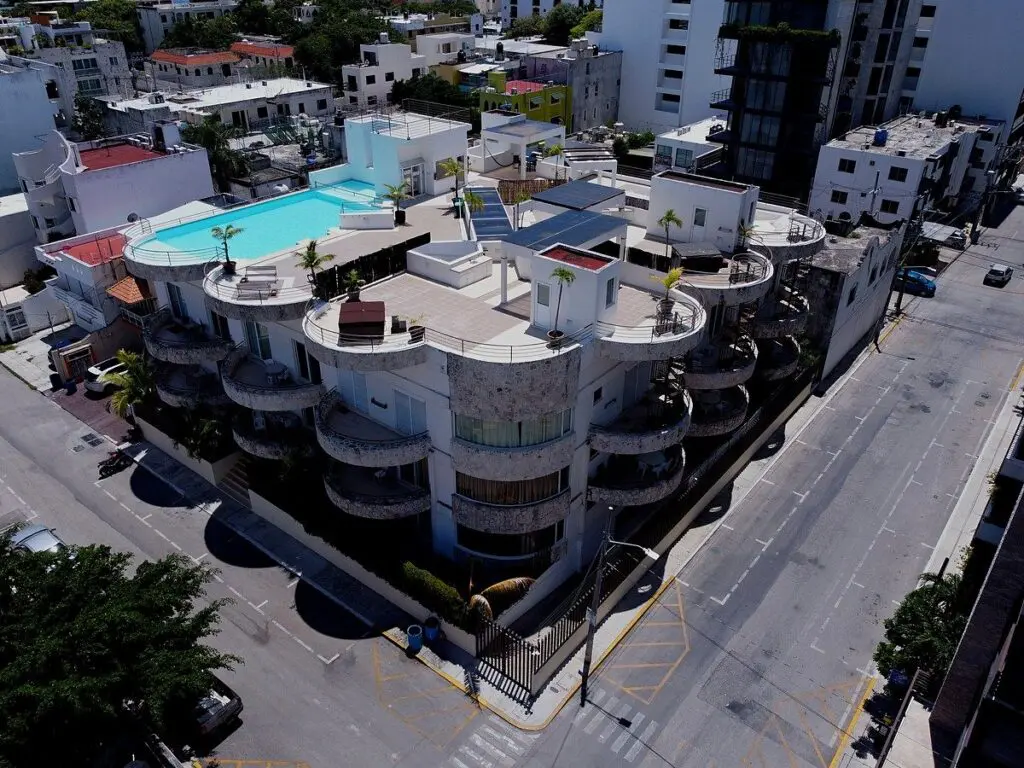 Rooftop pool on curved corner apartment building