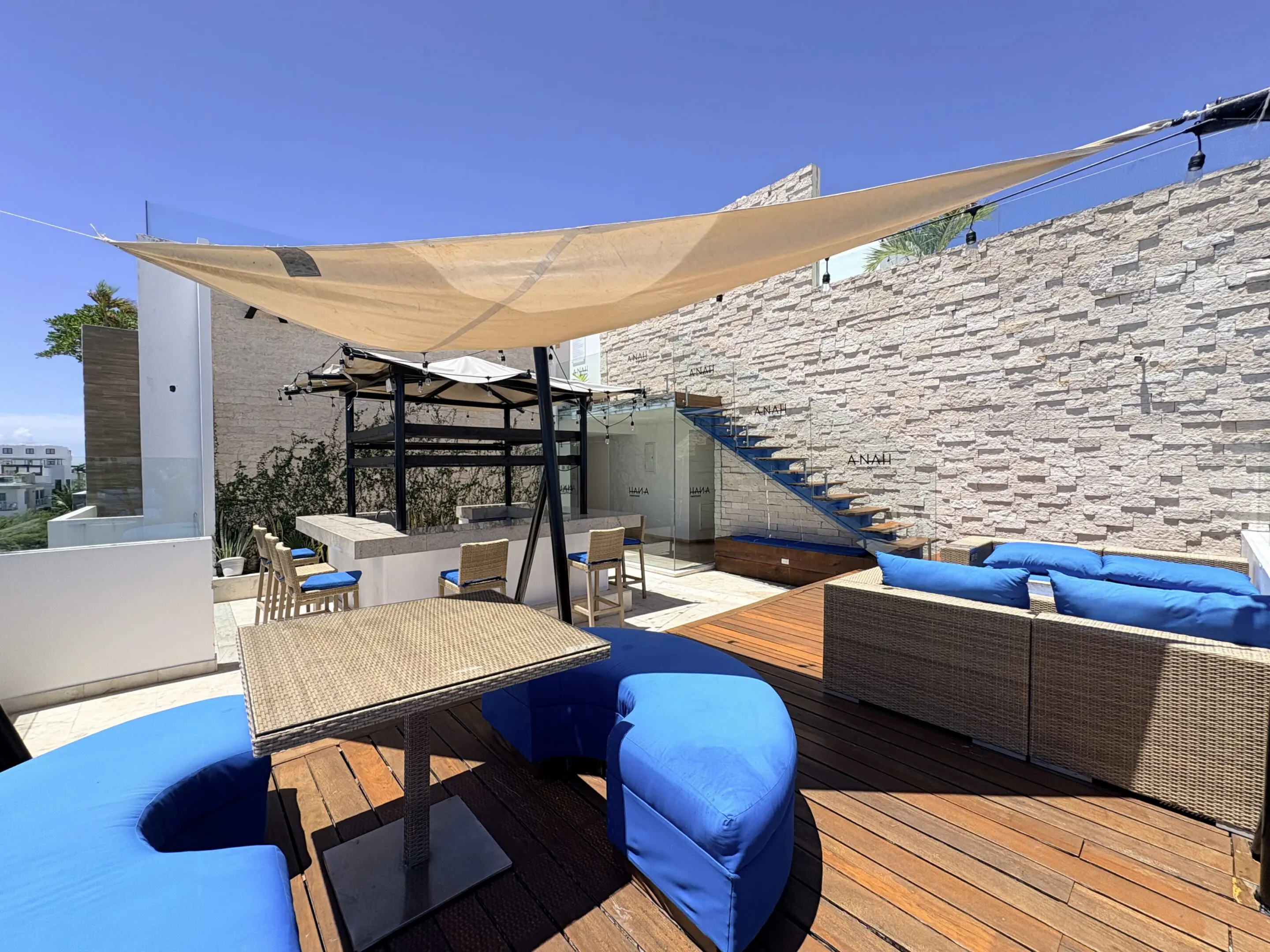 Rooftop terrace with blue outdoor seating