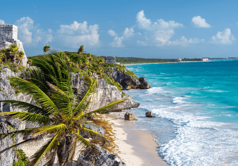 Tulum ruins on Caribbean cliff overlooking beach